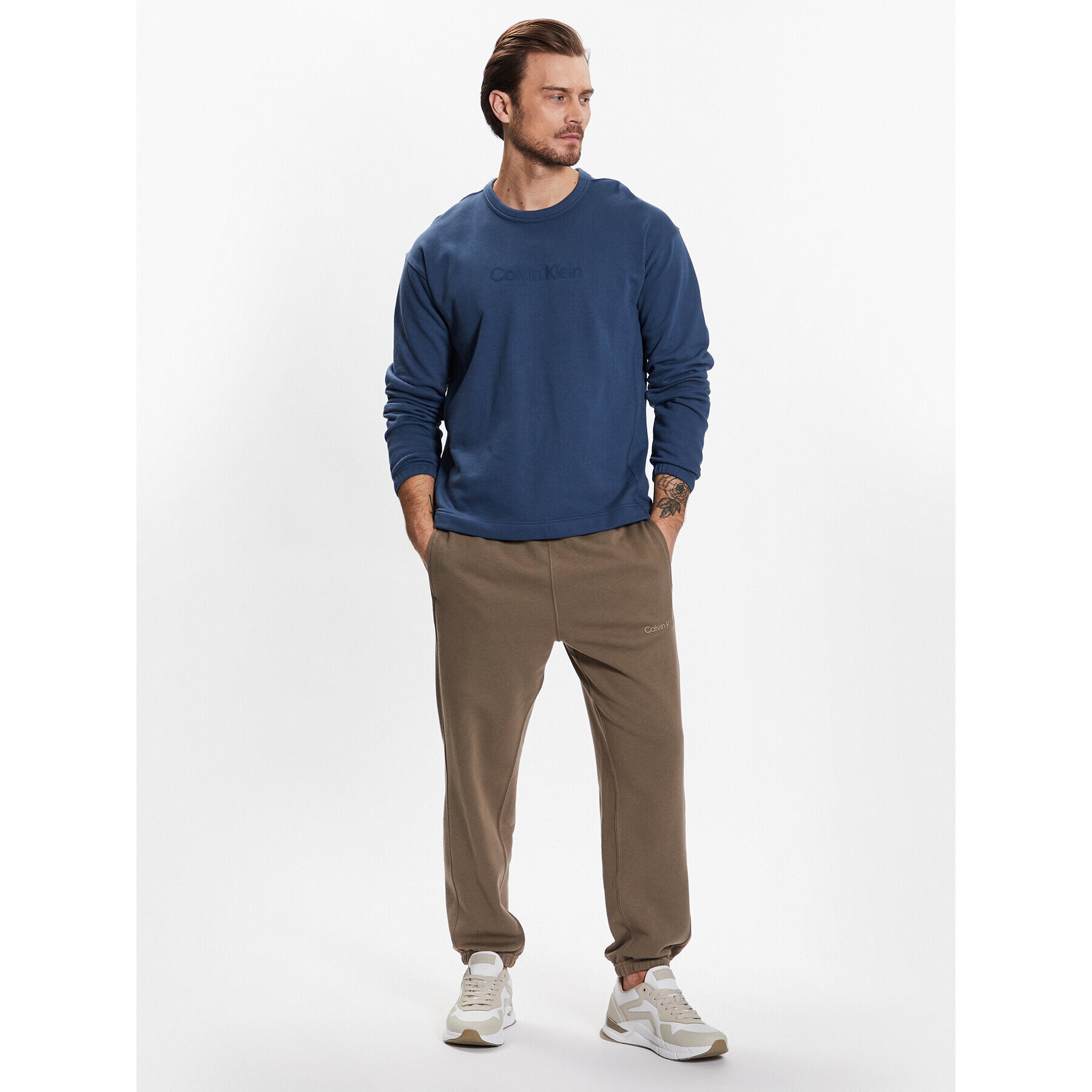 Calvin Klein Performance Spodnji del trenirke Knitt Pant 00GMS3P604 Khaki Relaxed Fit - Pepit.si