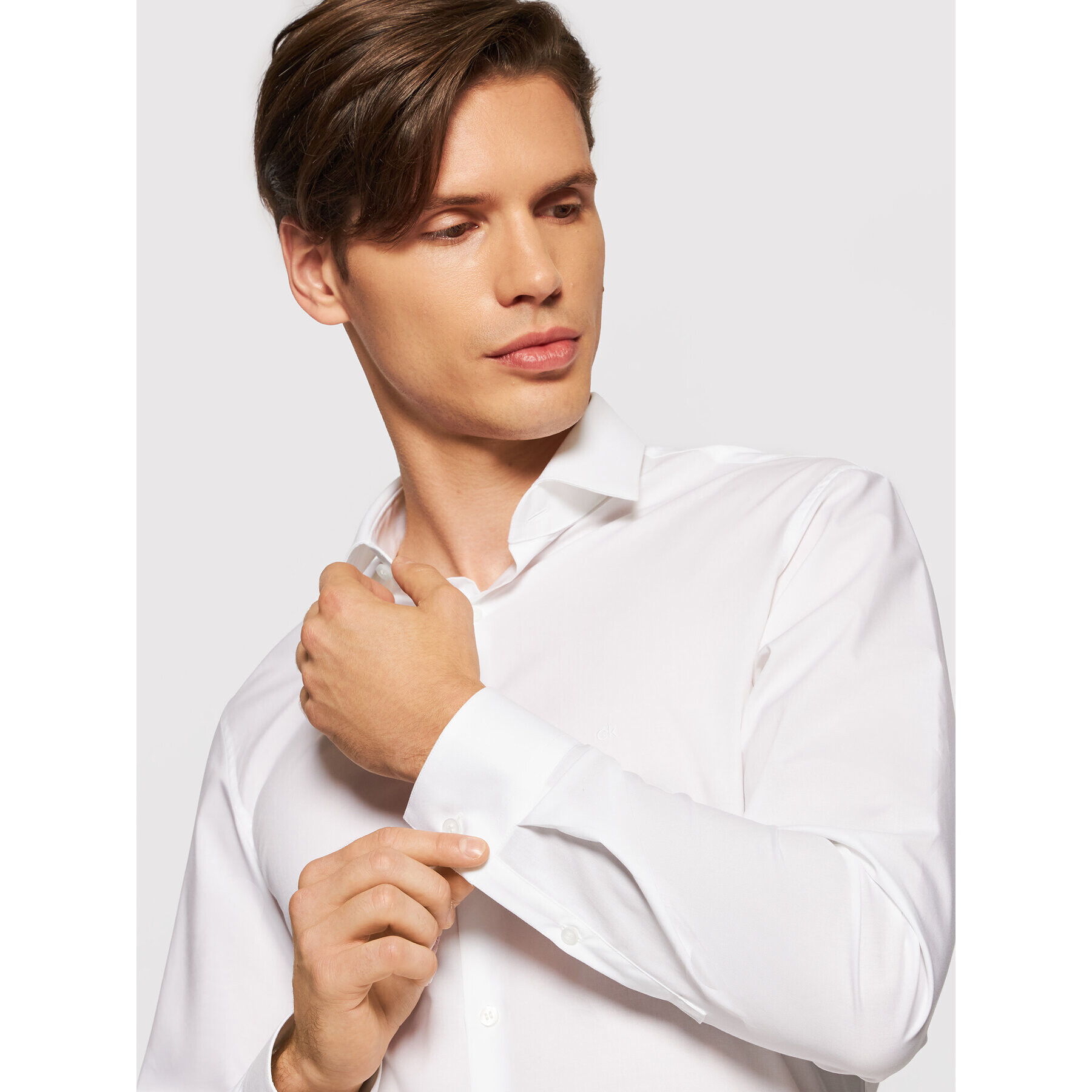 Calvin Klein Srajca 2ply Poplin Stretch Slim Shirt K10K103025 Bela Slim Fit - Pepit.si