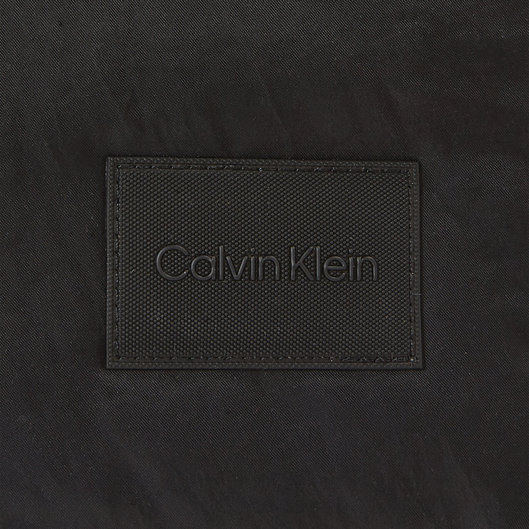 Calvin Klein Torbica za okrog pasu Rhombus Quilt Xs Crossover K50K510828 Črna - Pepit.si