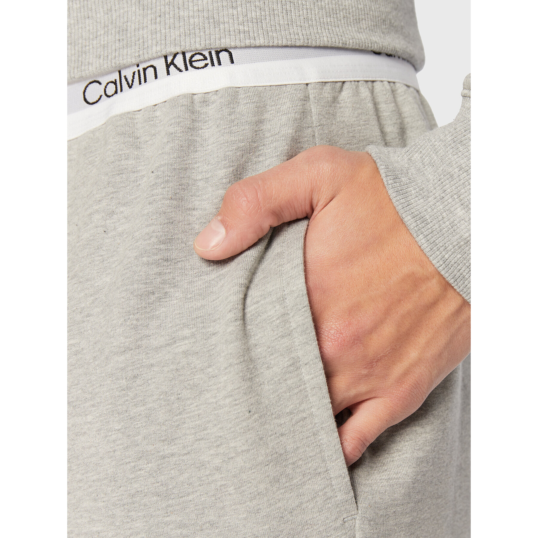 Calvin Klein Underwear Spodnji del pižame 000NM2302E Siva Regular Fit - Pepit.si