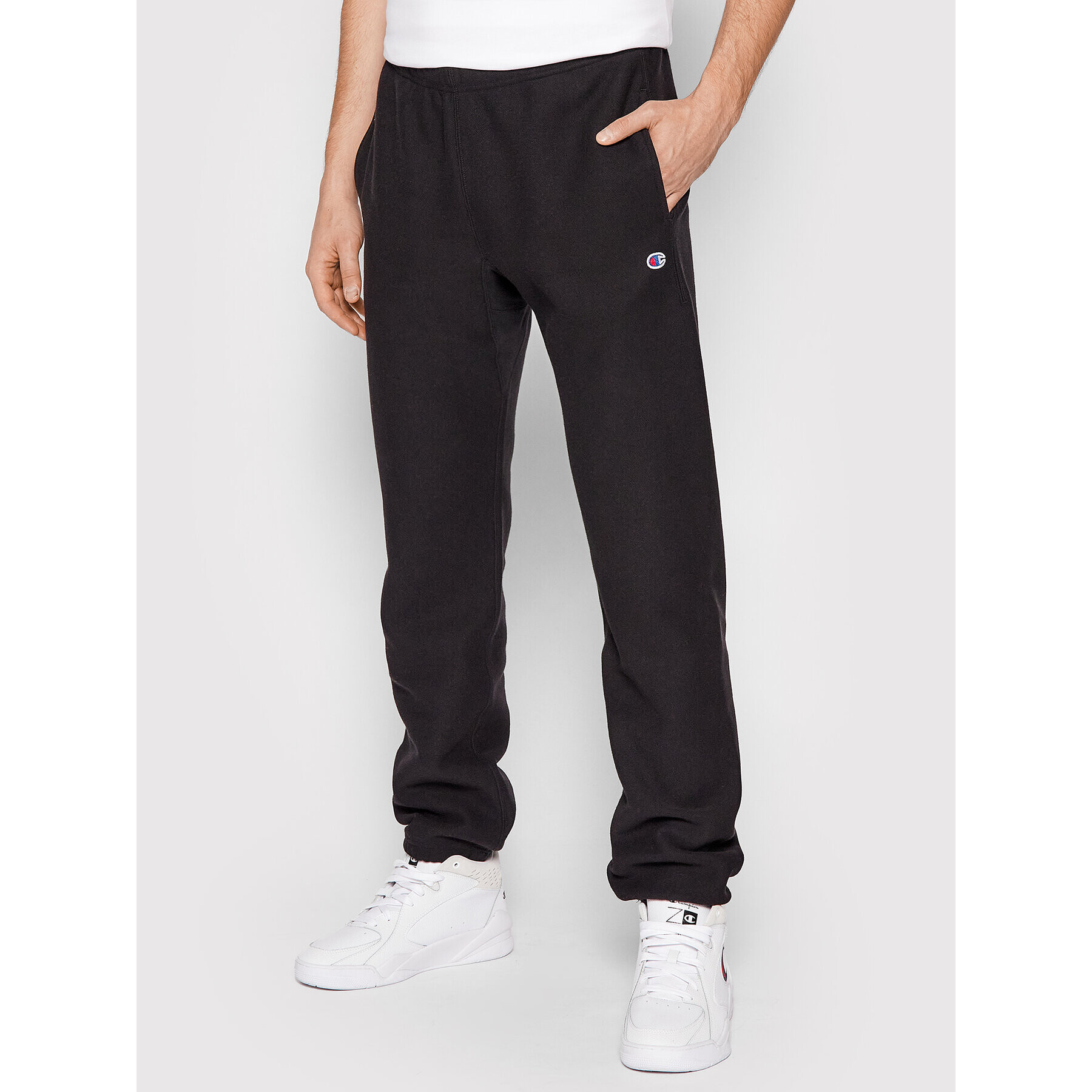 Champion Spodnji del trenirke Elasticated Cuffs 216540 Črna Regular Fit - Pepit.si