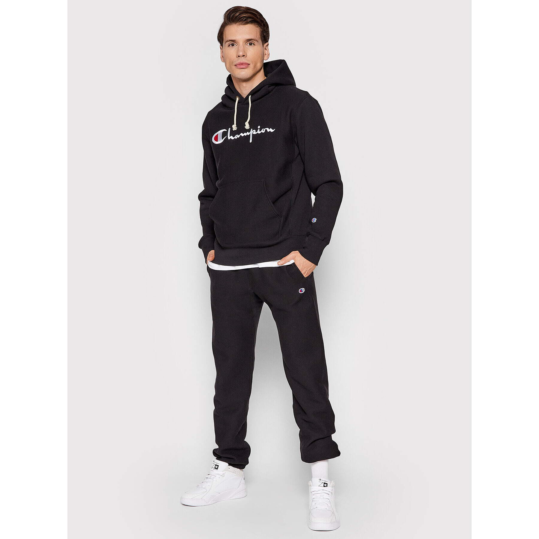 Champion Spodnji del trenirke Elasticated Cuffs 216540 Črna Regular Fit - Pepit.si