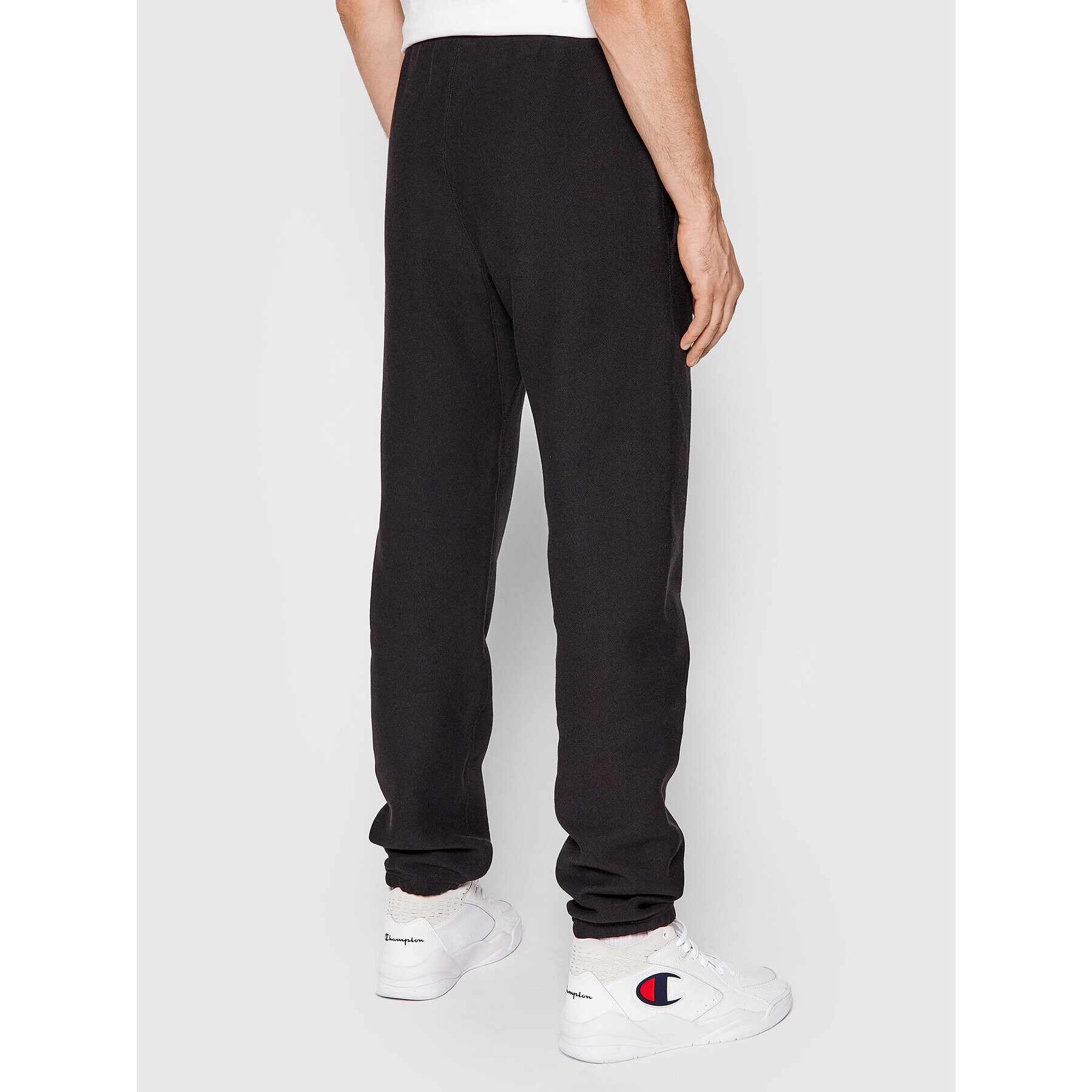 Champion Spodnji del trenirke Elasticated Cuffs 216540 Črna Regular Fit - Pepit.si