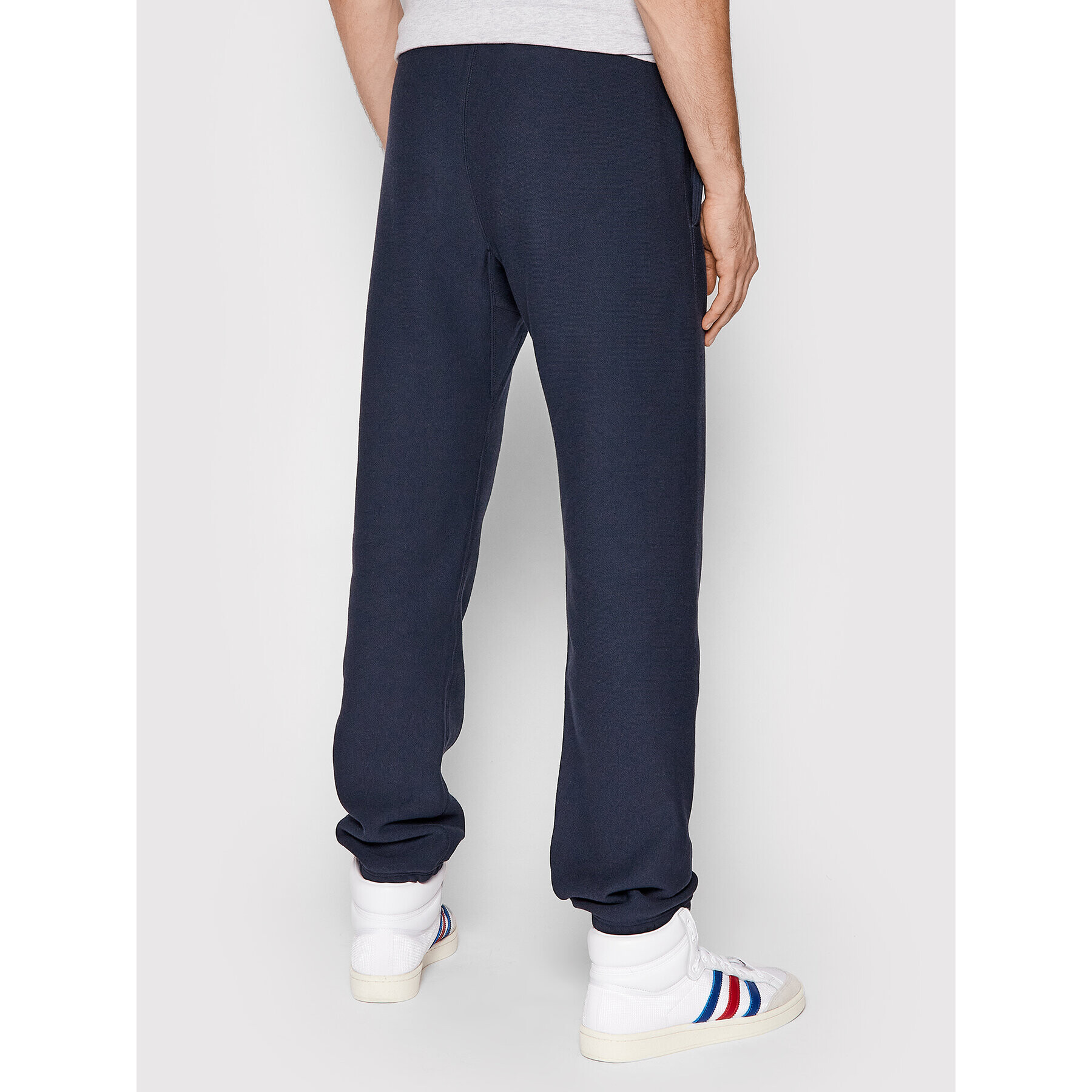 Champion Spodnji del trenirke Elasticated Cuffs 216540 Mornarsko modra Regular Fit - Pepit.si