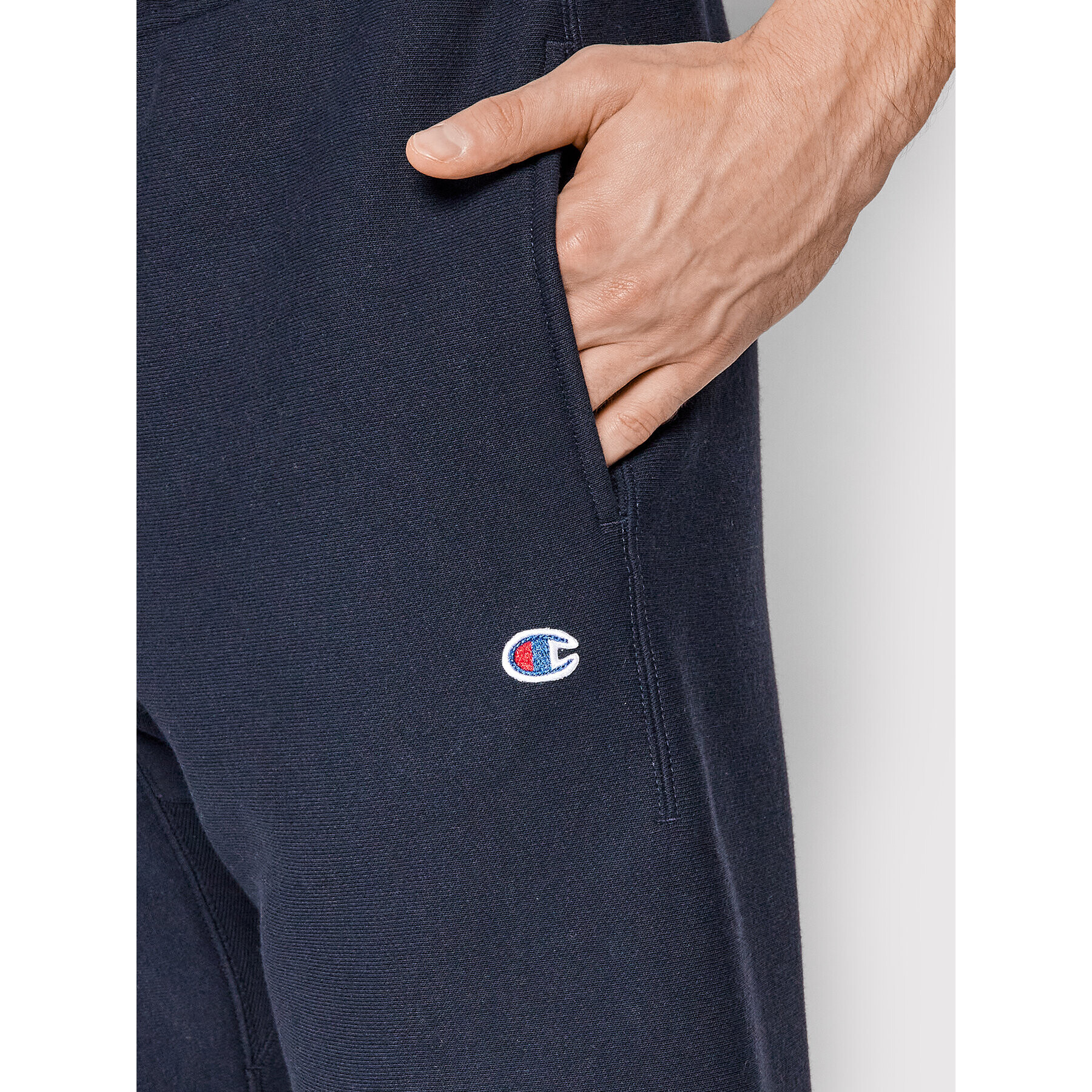 Champion Spodnji del trenirke Elasticated Cuffs 216540 Mornarsko modra Regular Fit - Pepit.si