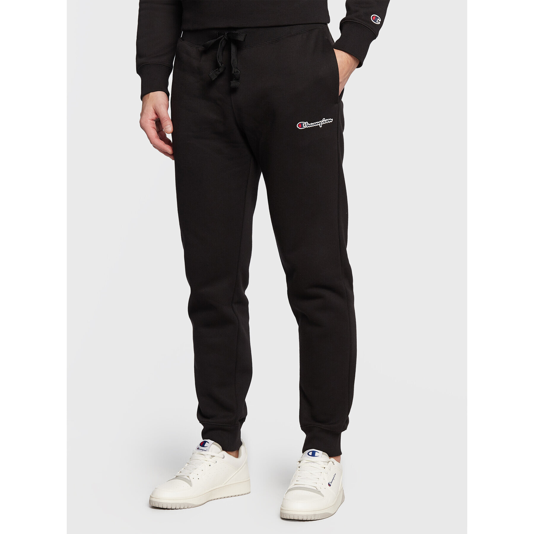 Champion Spodnji del trenirke Rib Cuff 217867 Črna Regular Fit - Pepit.si