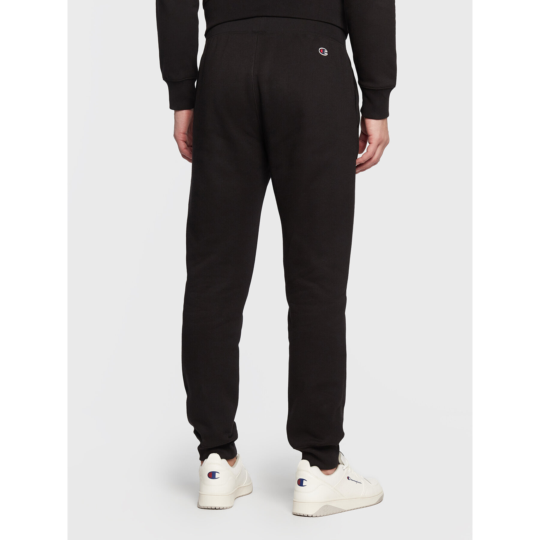 Champion Spodnji del trenirke Rib Cuff 217867 Črna Regular Fit - Pepit.si