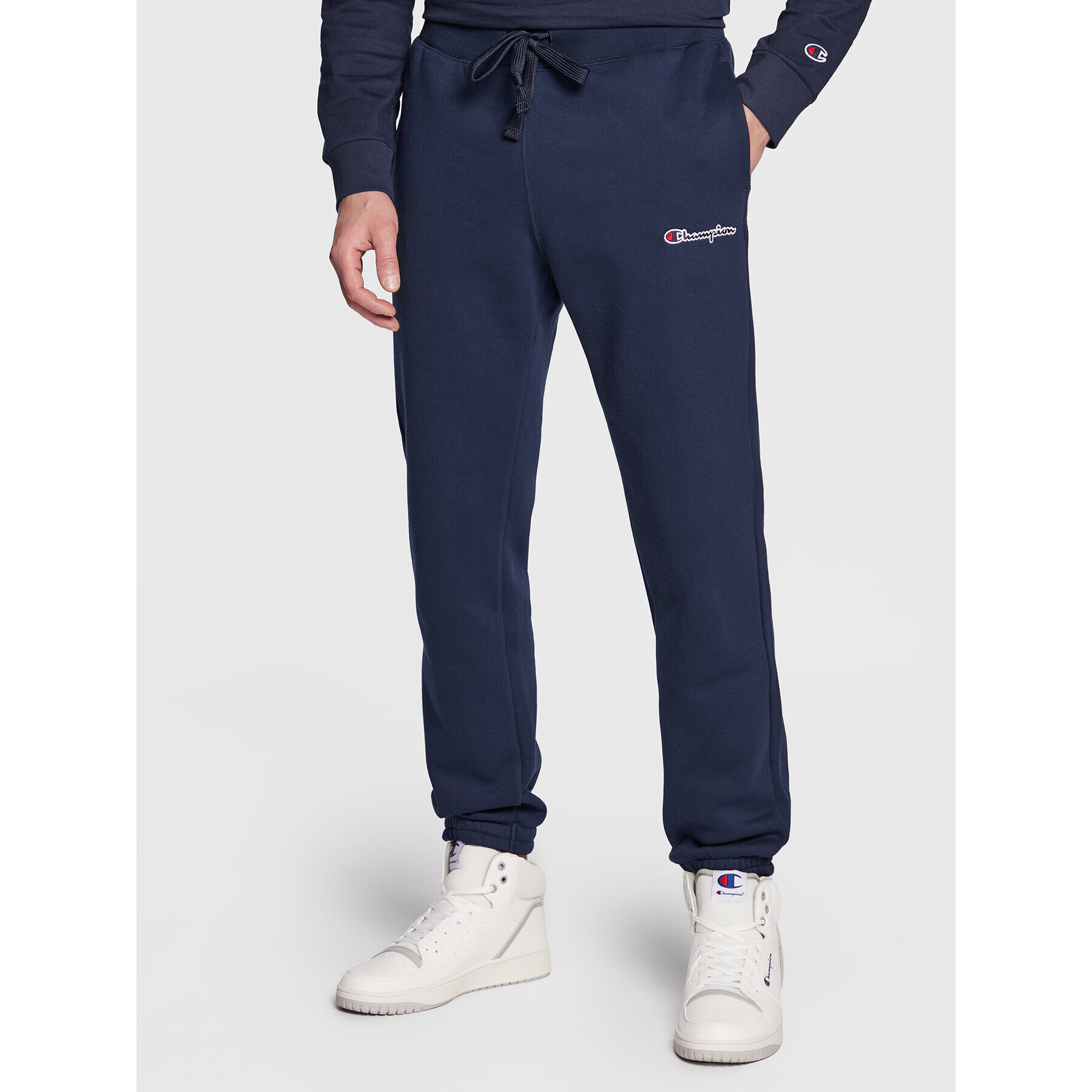 Champion Spodnji del trenirke Small Embroidery Script 218294 Mornarsko modra Regular Fit - Pepit.si