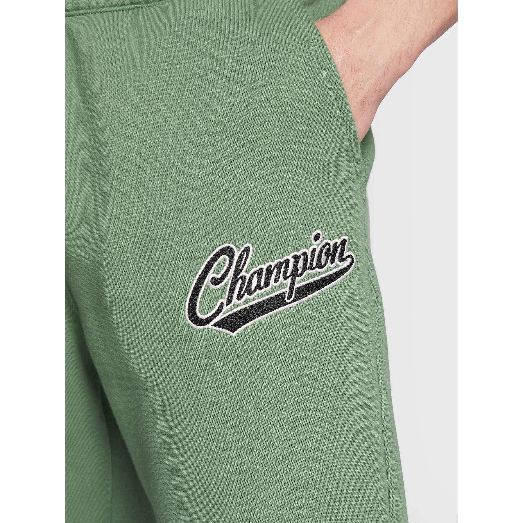 Champion Spodnji del trenirke Varsity 217889 Zelena Regular Fit - Pepit.si