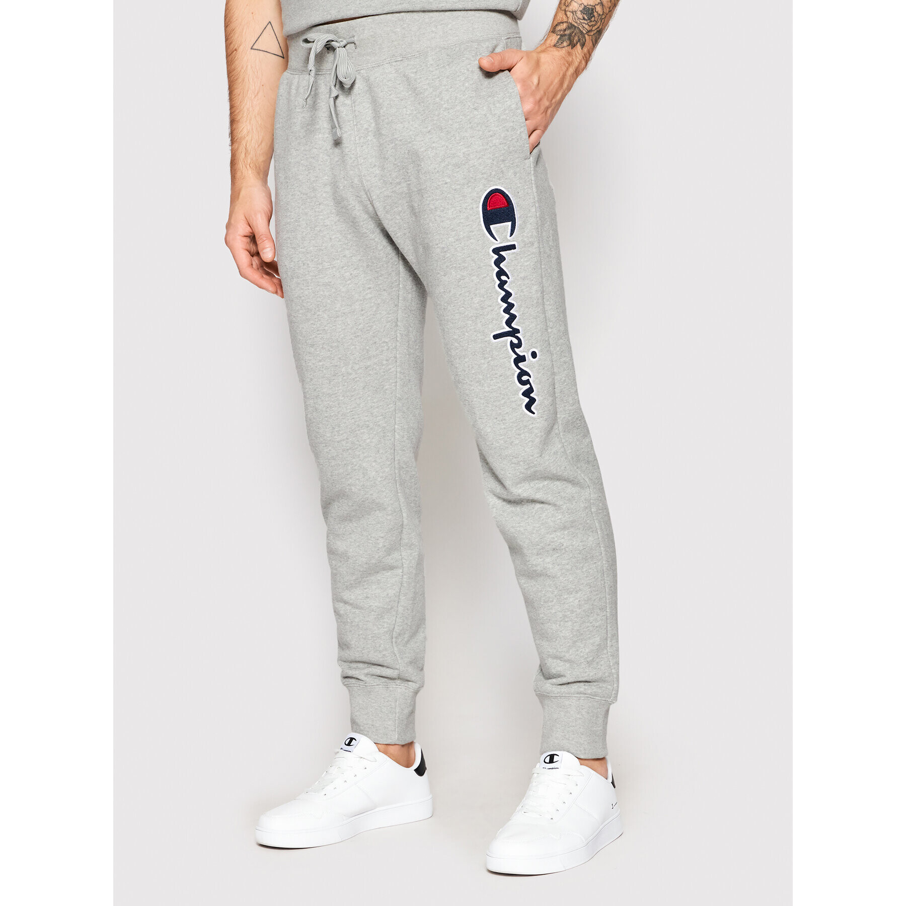 Champion Spodnji del trenirke Vertical Logo 217062 Siva Regular Fit - Pepit.si