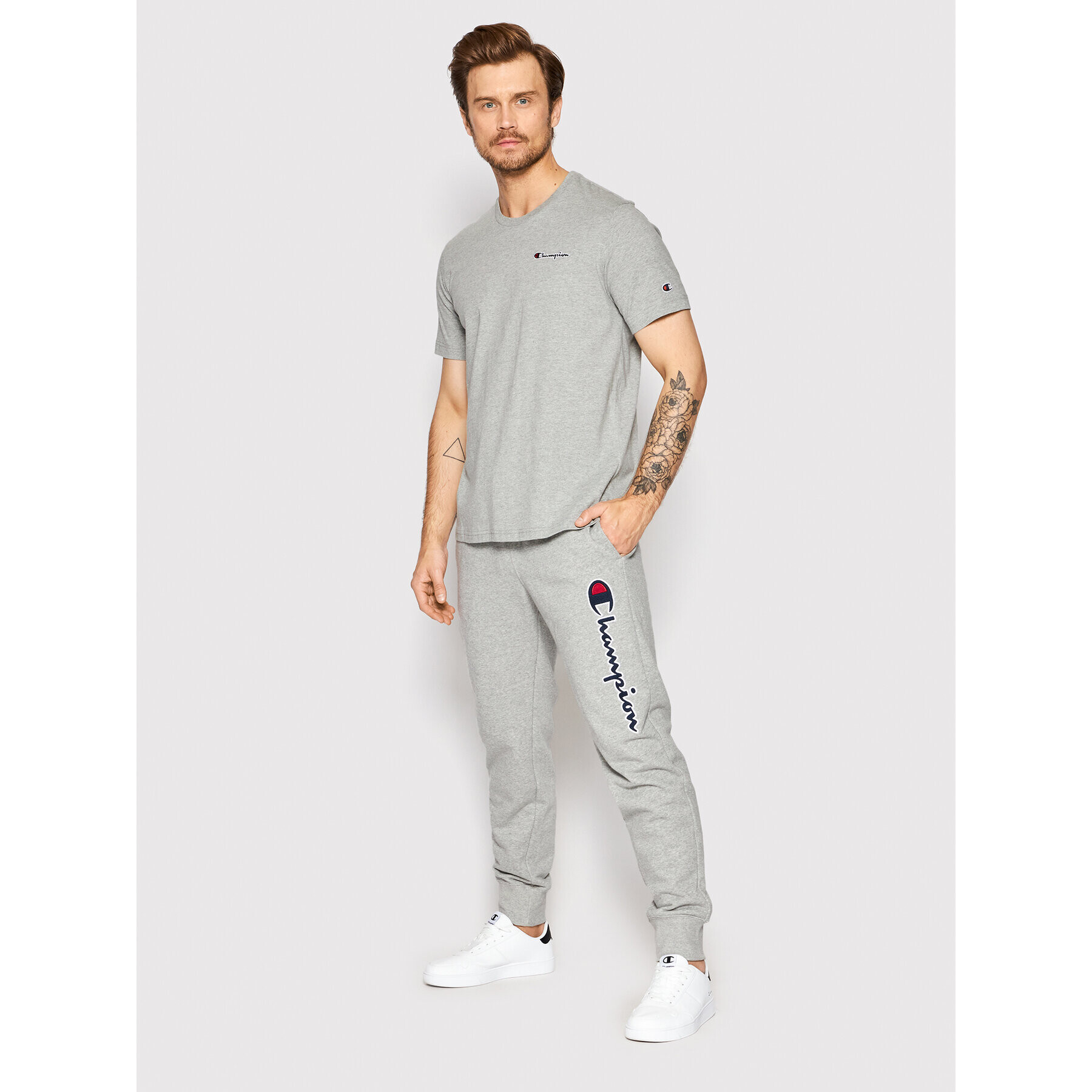 Champion Spodnji del trenirke Vertical Logo 217062 Siva Regular Fit - Pepit.si