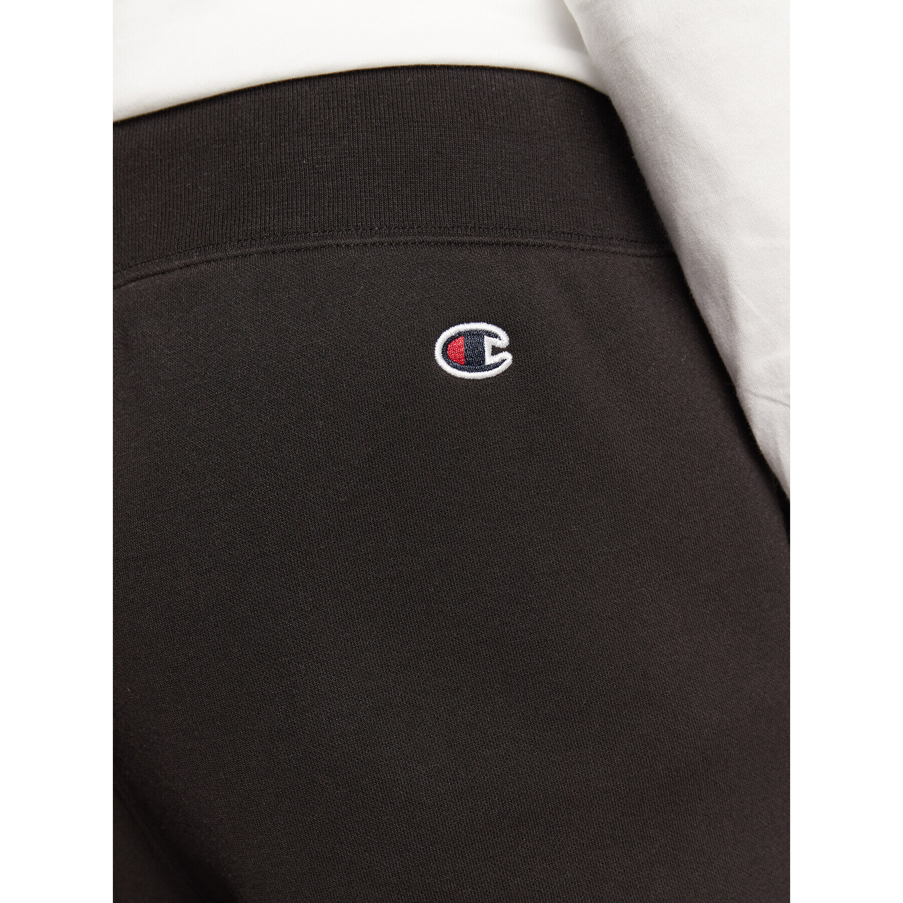 Champion Spodnji del trenirke Vertical Logo Embroidery 217860 Črna Regular Fit - Pepit.si