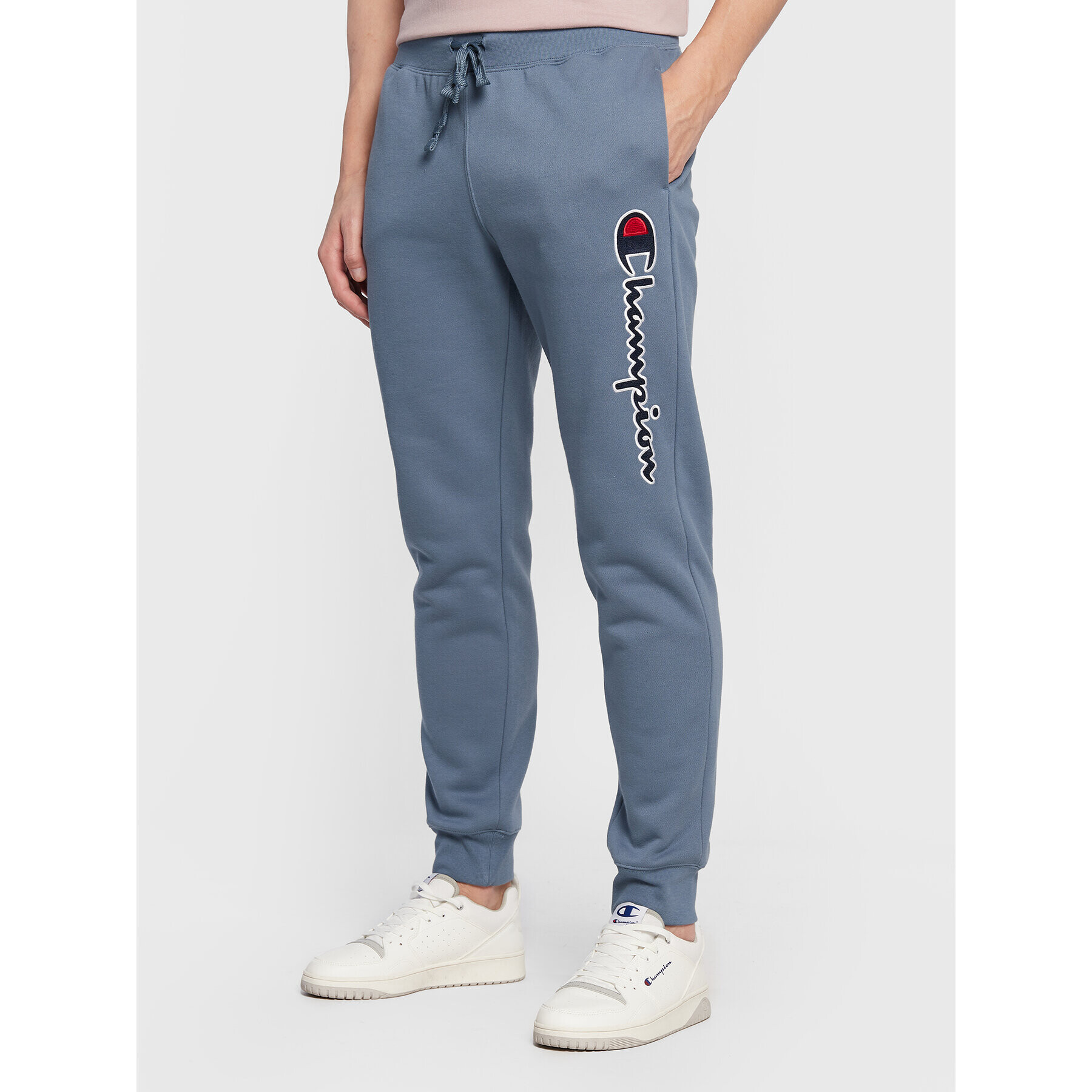 Champion Spodnji del trenirke Vertical Logo Embroidery 217860 Modra Regular Fit - Pepit.si