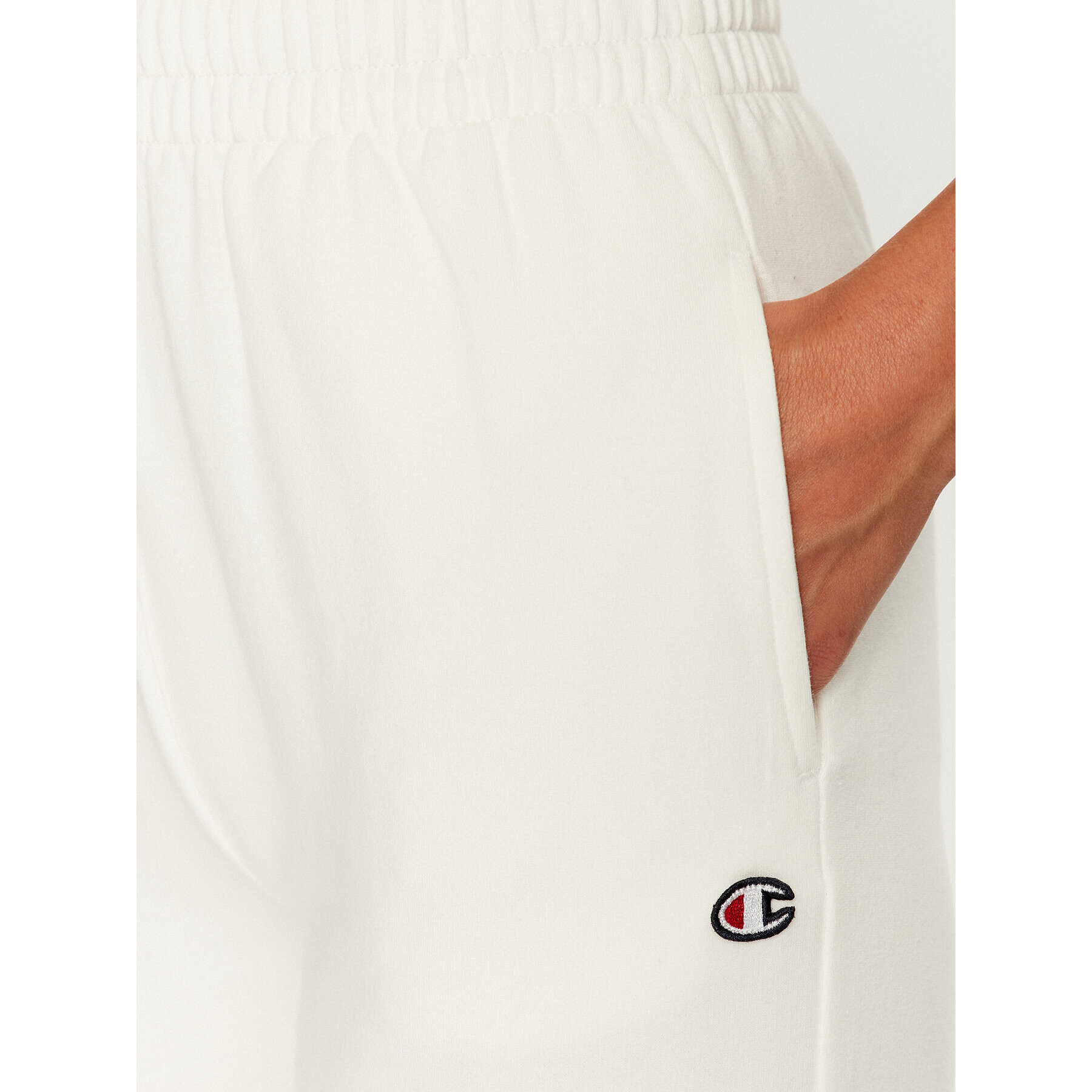 Champion Spodnji del trenirke Wide Leg Pants 116613 Écru Regular Fit - Pepit.si