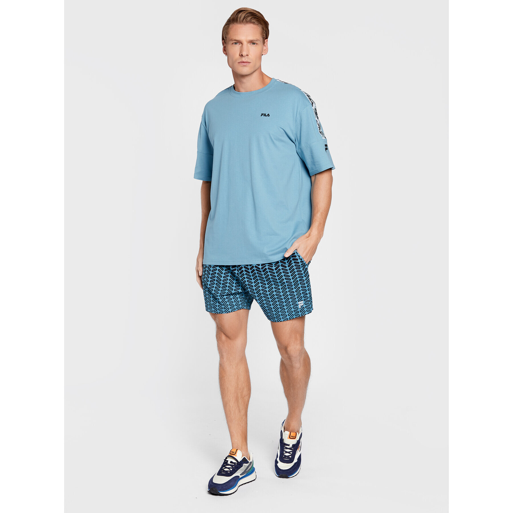 Fila Majica Brittnau FAM0194 Modra Relaxed Fit - Pepit.si