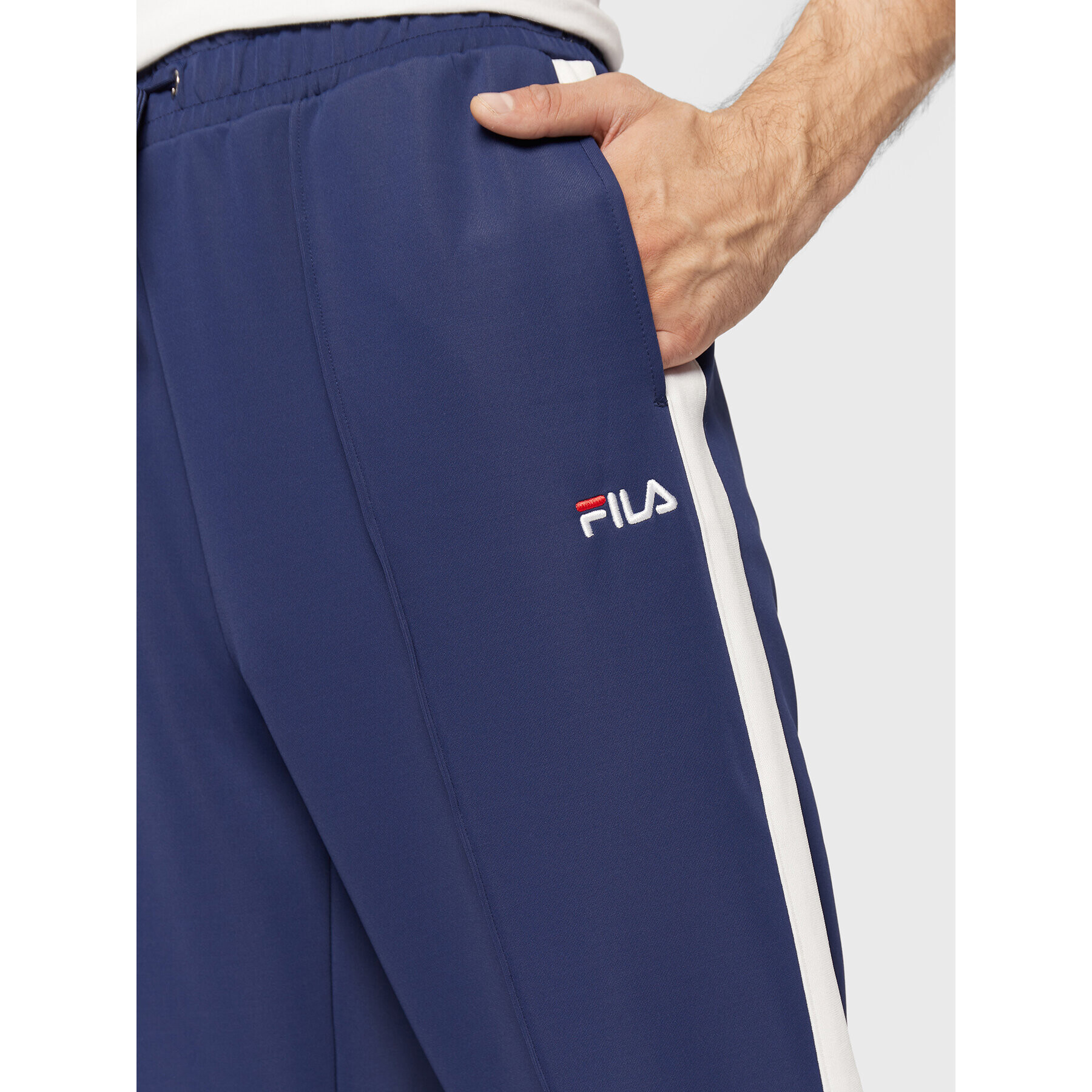 Fila Spodnji del trenirke Bruges FAM0174 Mornarsko modra Regular Fit - Pepit.si