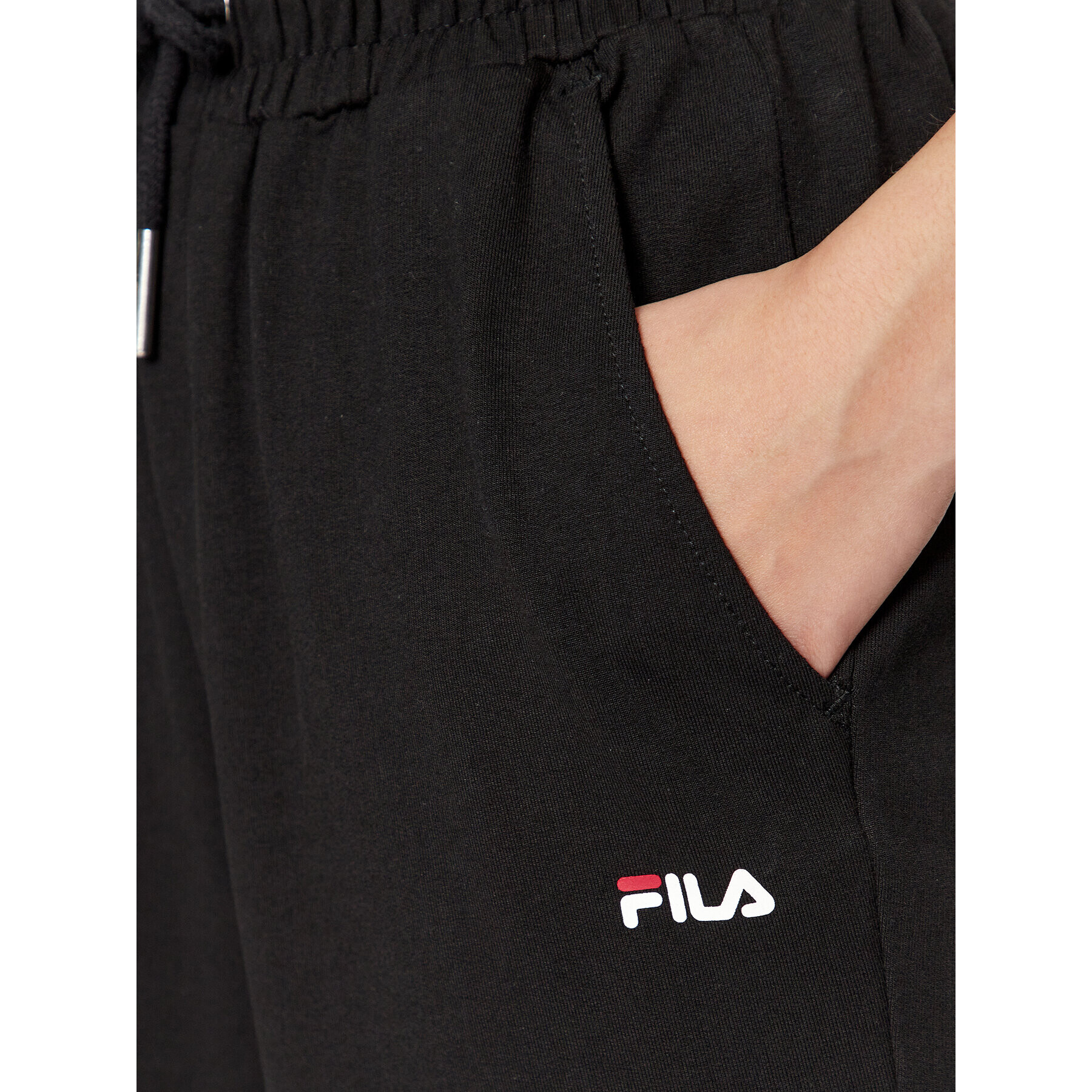 Fila Spodnji del trenirke FAW0559 Črna Relaxed Fit - Pepit.si