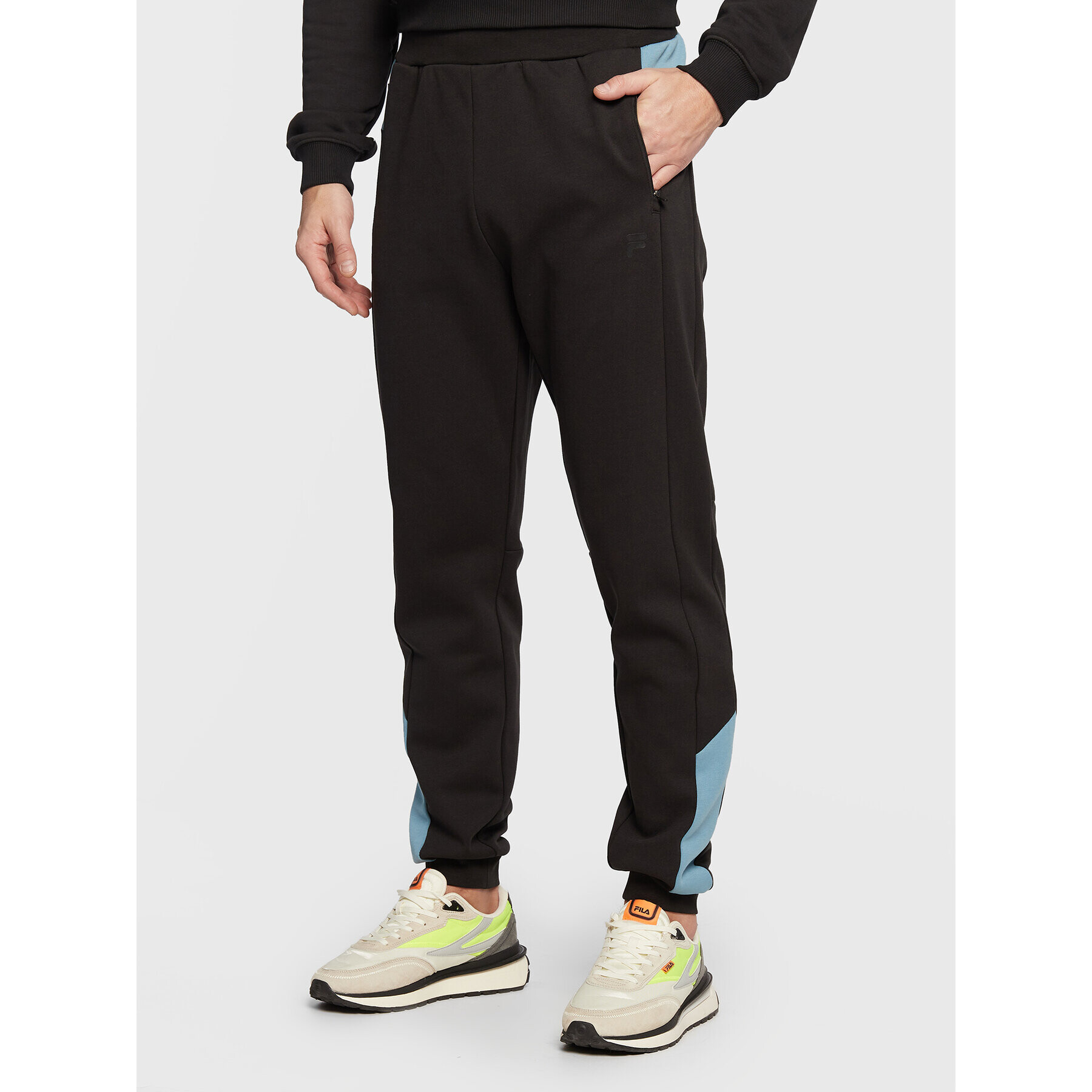 Fila Spodnji del trenirke Rabaul FAM0129 Črna Slim Fit - Pepit.si