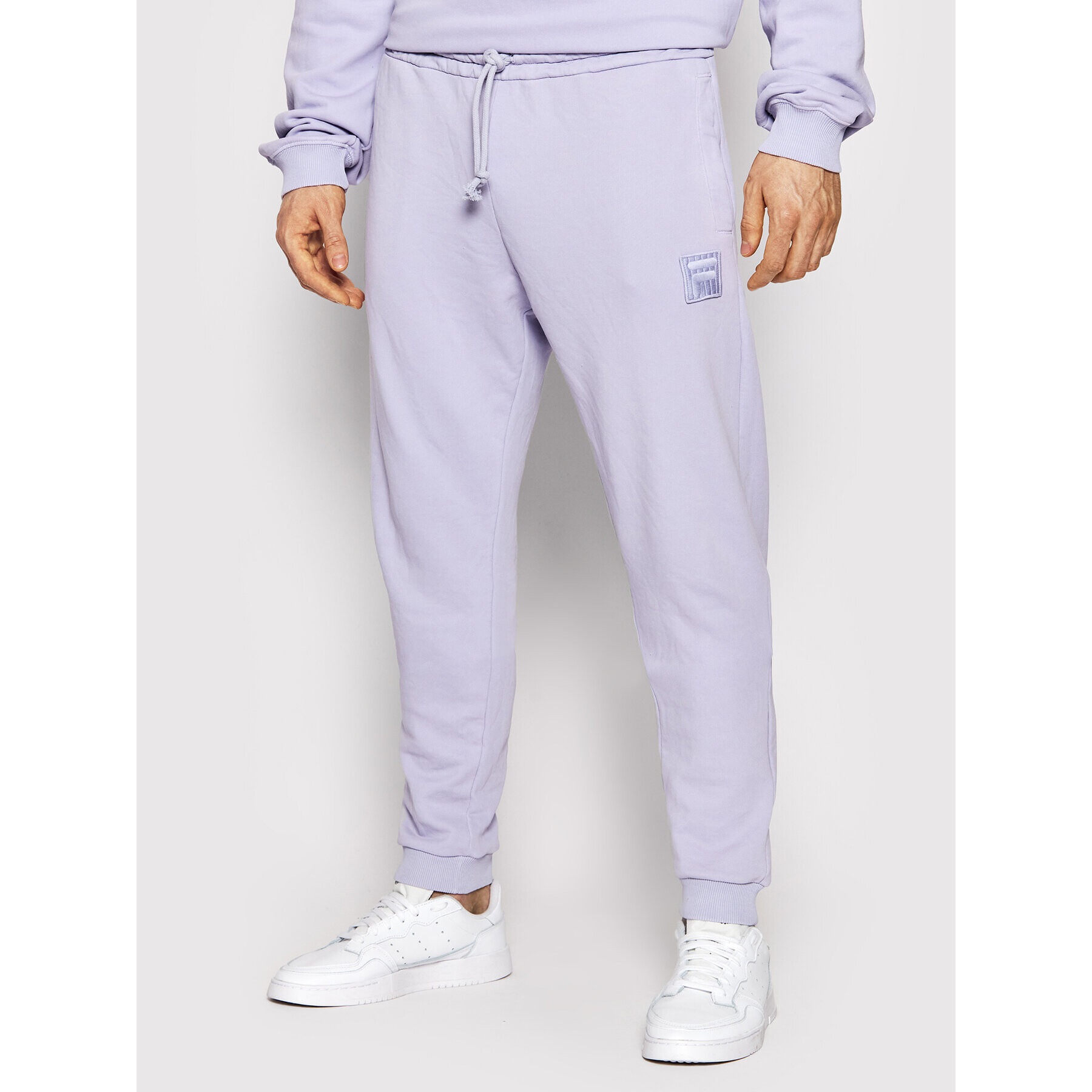 Fila Spodnji del trenirke Unisex Bastogne FAU0004 Vijolična Regular Fit - Pepit.si