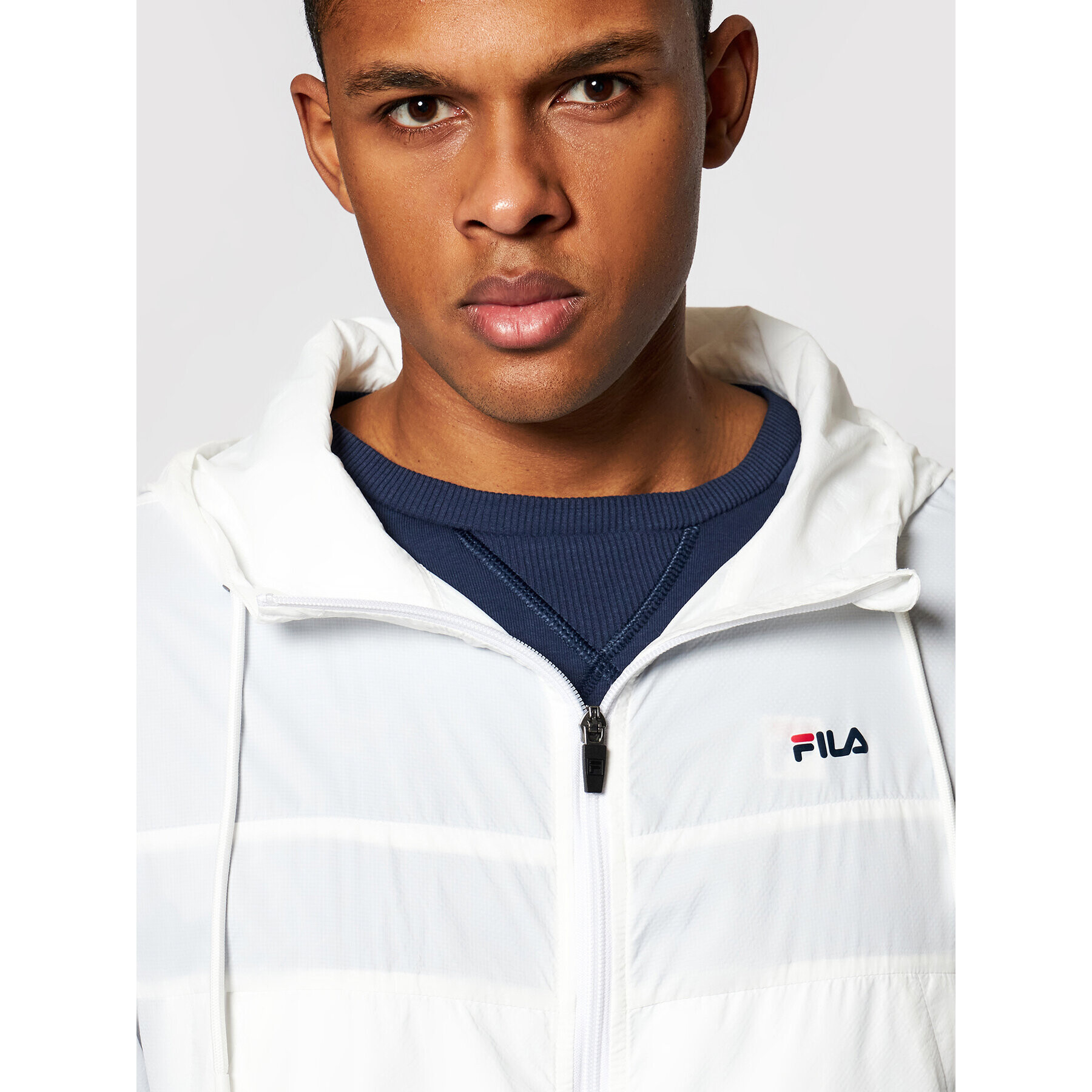 Fila Vetrovka Eracio 688443 Bela Regular Fit - Pepit.si