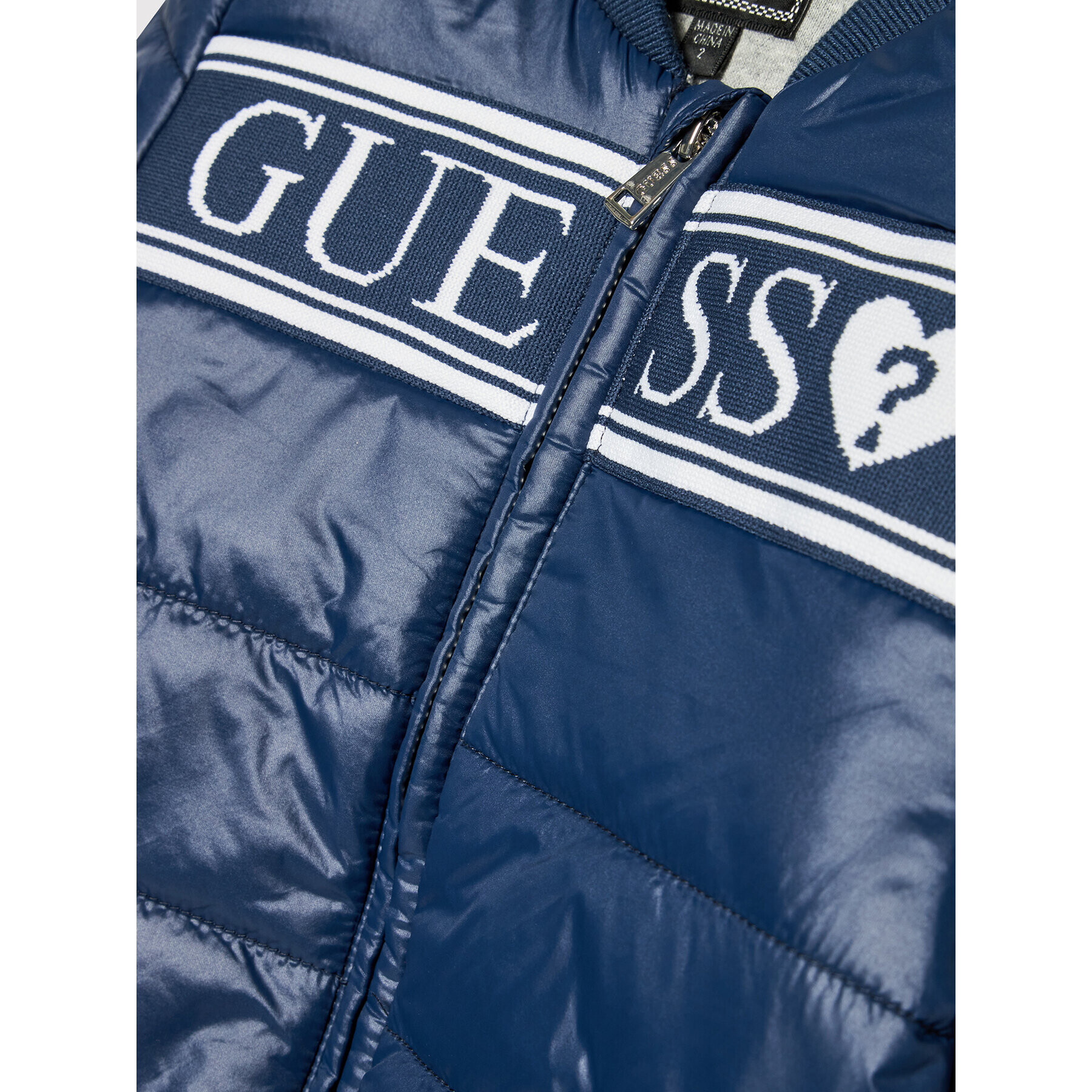 Guess Bomber jakna K2RL03 WCBS0 Mornarsko modra Regular Fit - Pepit.si