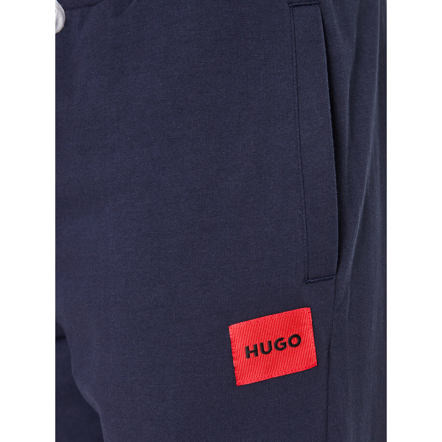 Hugo Spodnji del trenirke 50490270 Mornarsko modra Regular Fit - Pepit.si