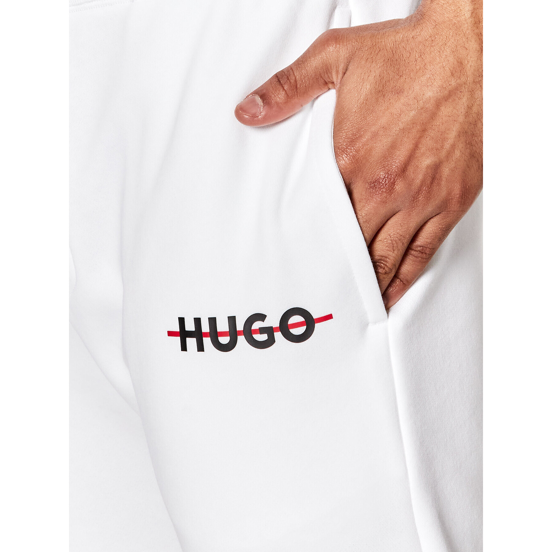 Hugo Spodnji del trenirke Danks 50481152 Bela Relaxed Fit - Pepit.si