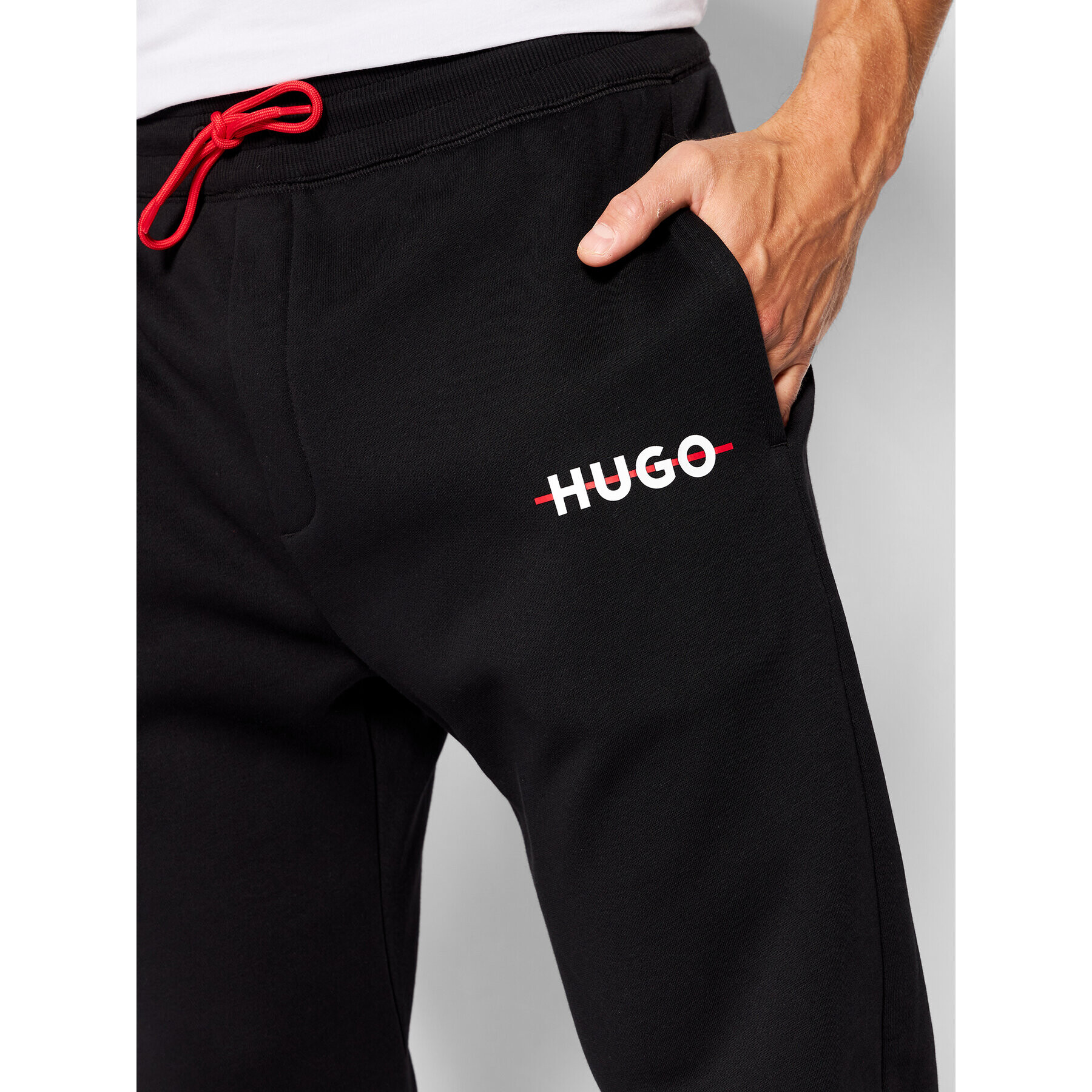 Hugo Spodnji del trenirke Danks 50481152 Črna Relaxed Fit - Pepit.si