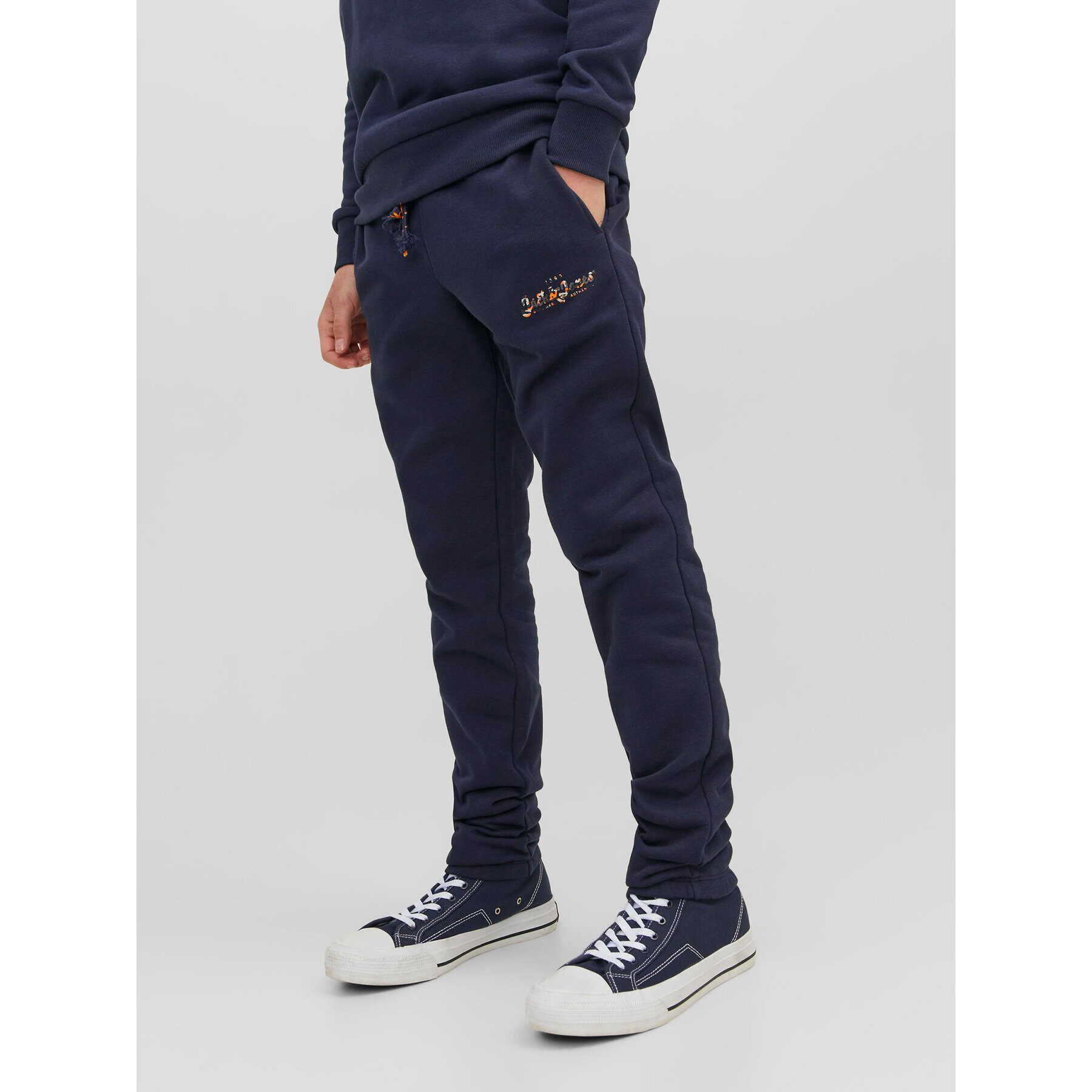 Jack&Jones Junior Spodnji del trenirke 12237173 Mornarsko modra Comfort Fit - Pepit.si