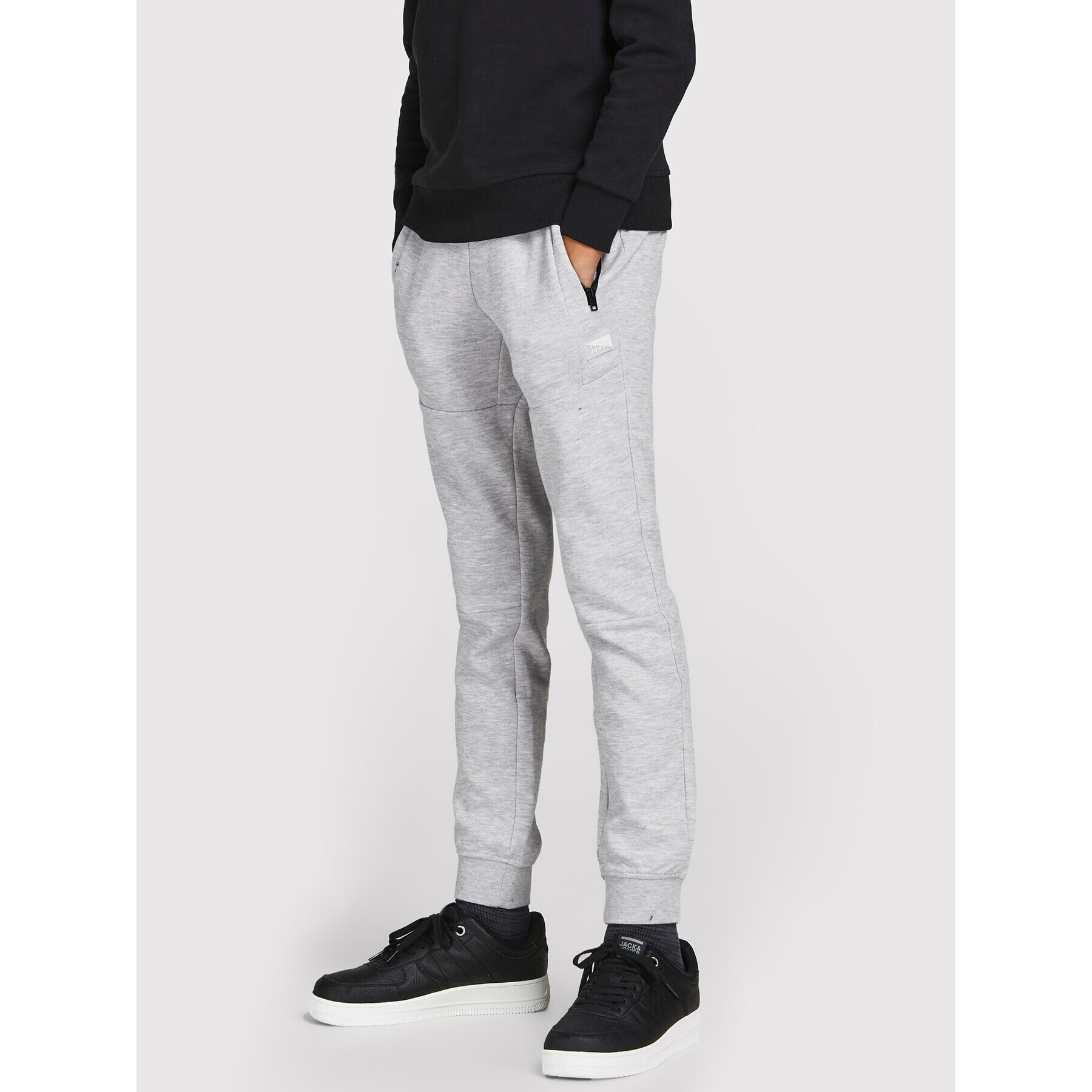 Jack&Jones Junior Spodnji del trenirke Will 12189809 Siva Regular Fit - Pepit.si