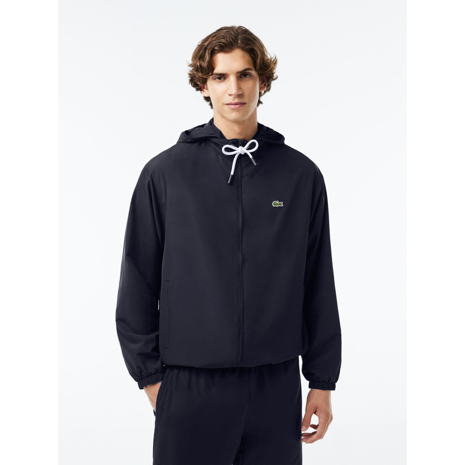 Lacoste Prehodna jakna BH1679 Mornarsko modra Regular Fit - Pepit.si