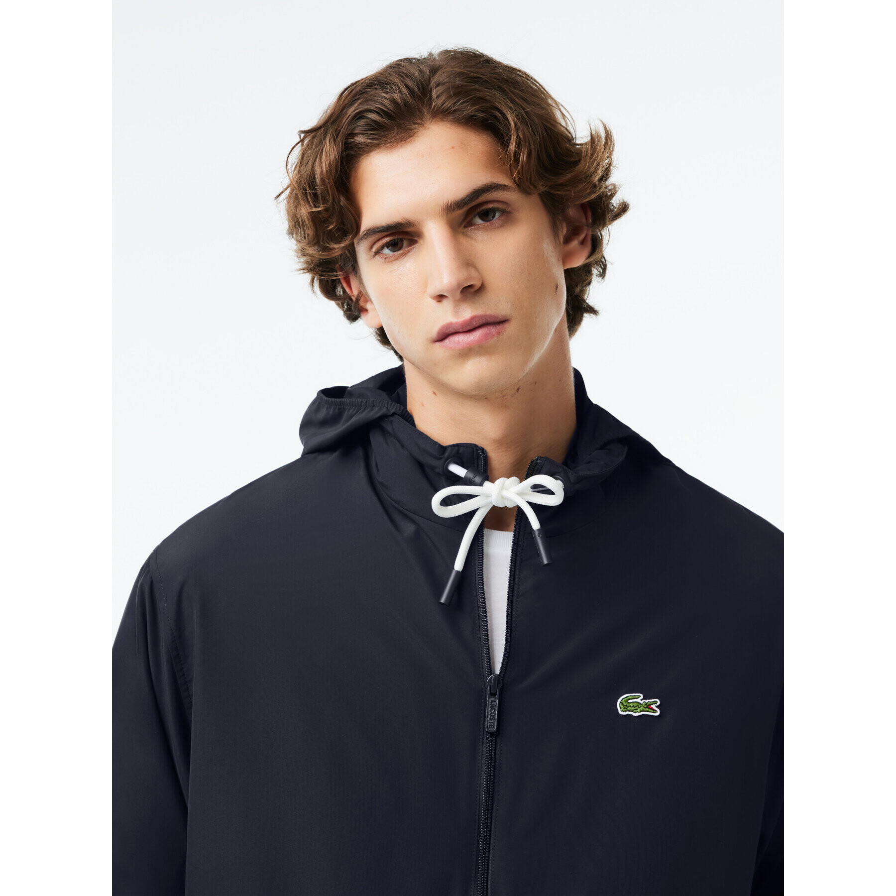 Lacoste Prehodna jakna BH1679 Mornarsko modra Regular Fit - Pepit.si