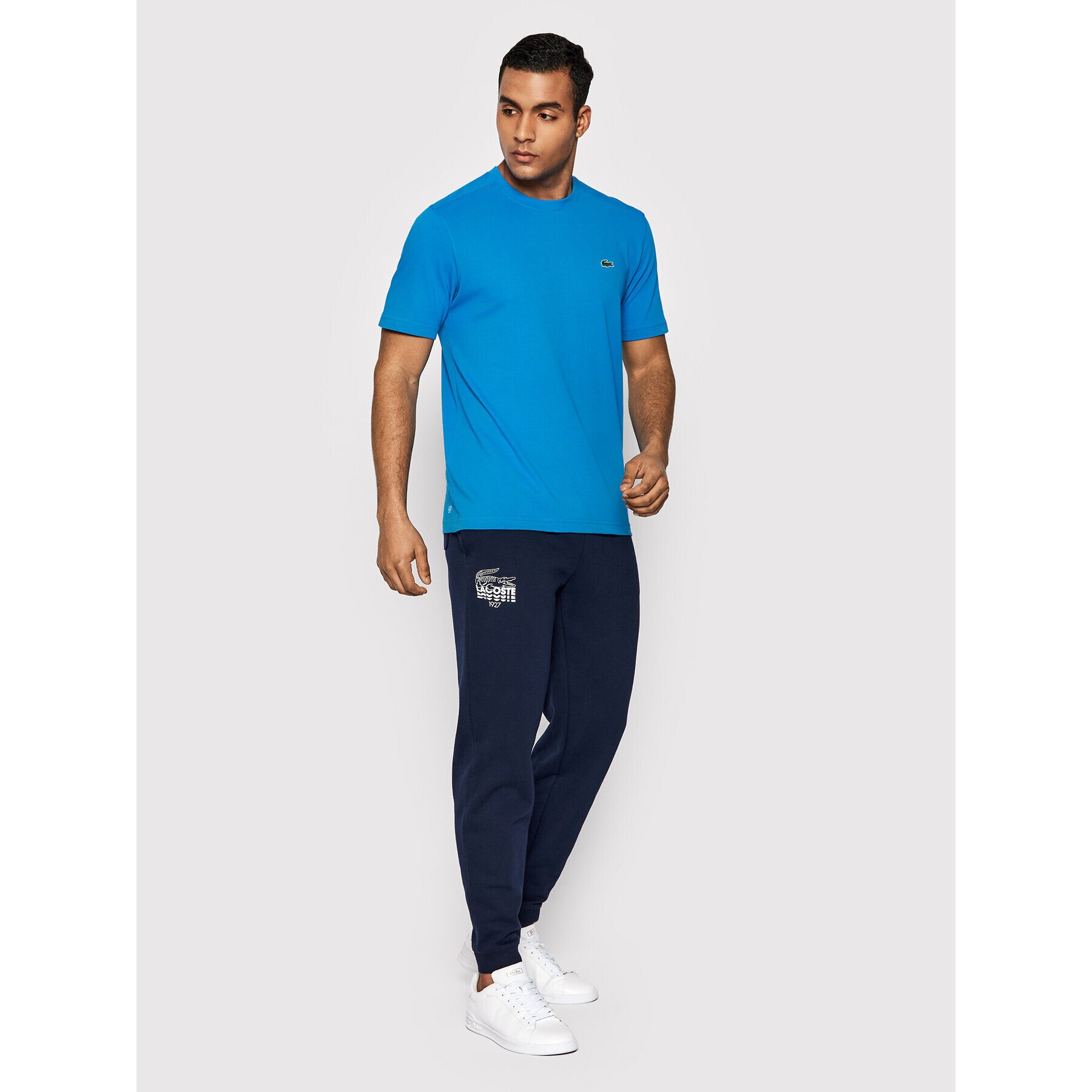 Lacoste Spodnji del trenirke XH3357 Mornarsko modra Slim Fit - Pepit.si