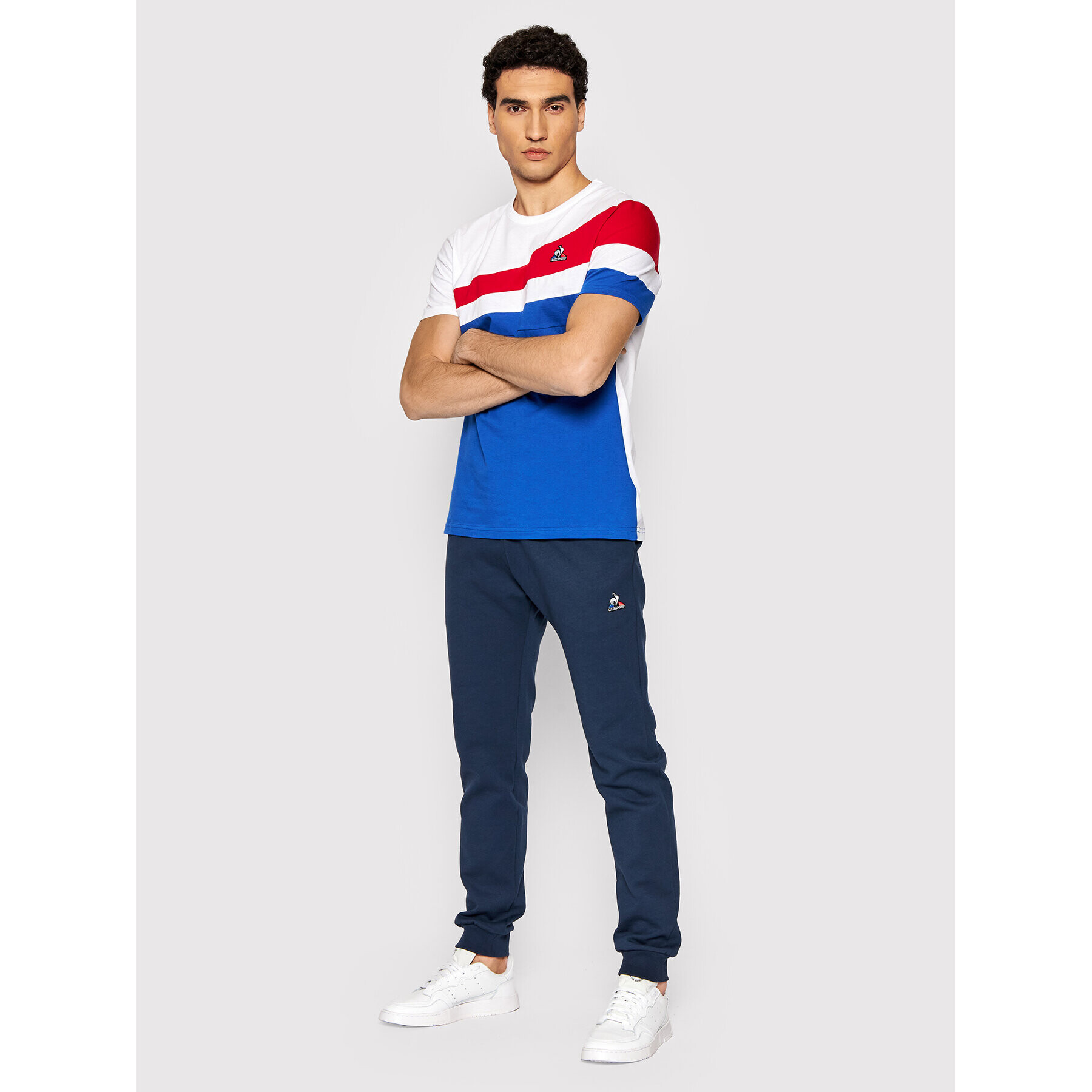 Le Coq Sportif Spodnji del trenirke 2120212 Mornarsko modra Slim Fit - Pepit.si