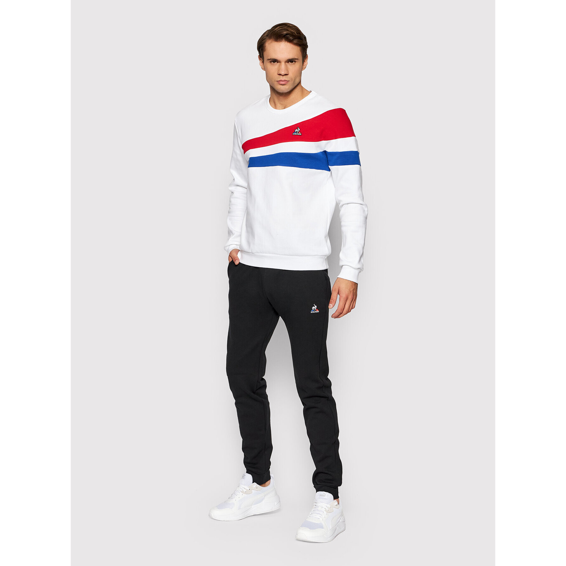 Le Coq Sportif Spodnji del trenirke 2120408 Črna Slim Fit - Pepit.si