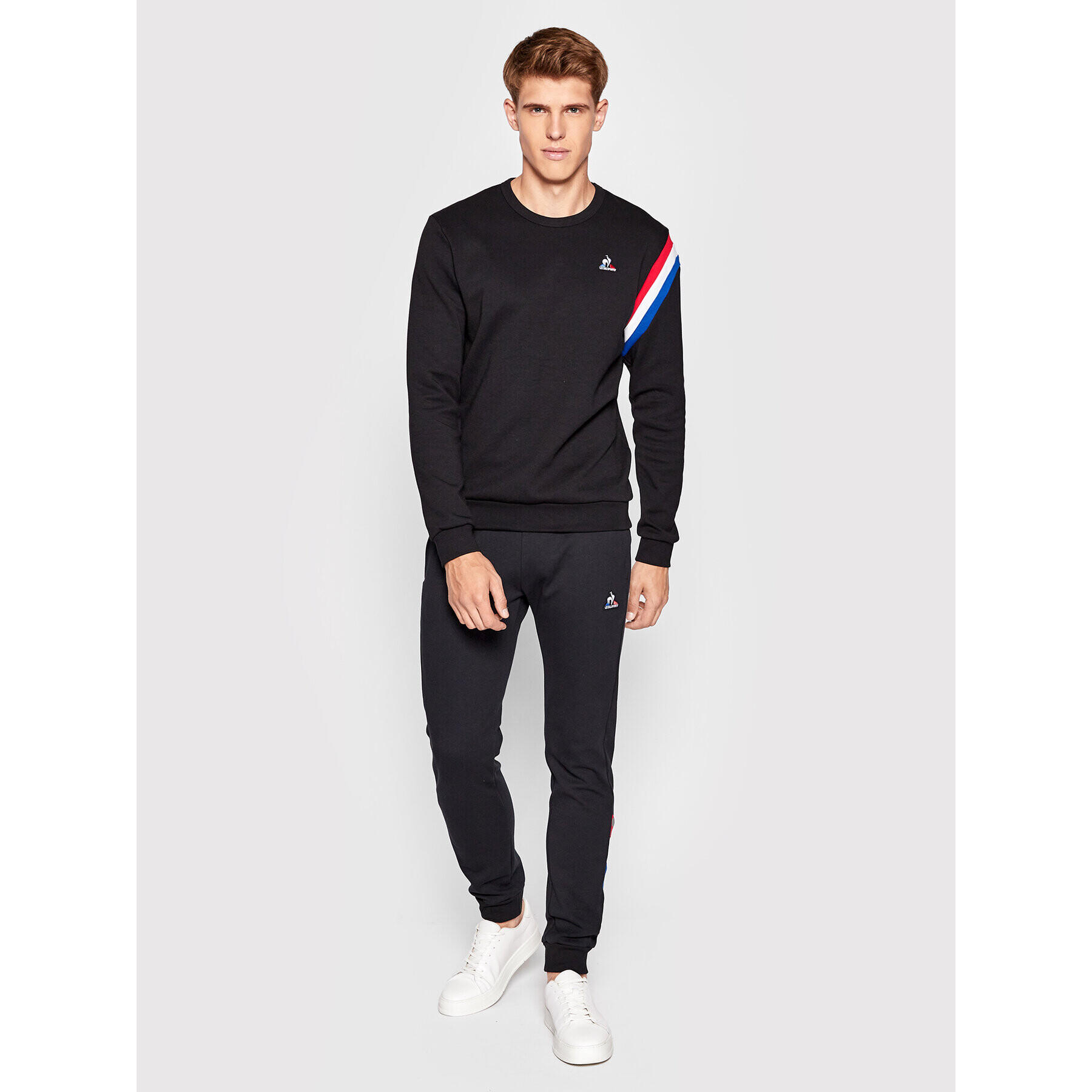 Le Coq Sportif Spodnji del trenirke 2210380 Črna Slim Fit - Pepit.si