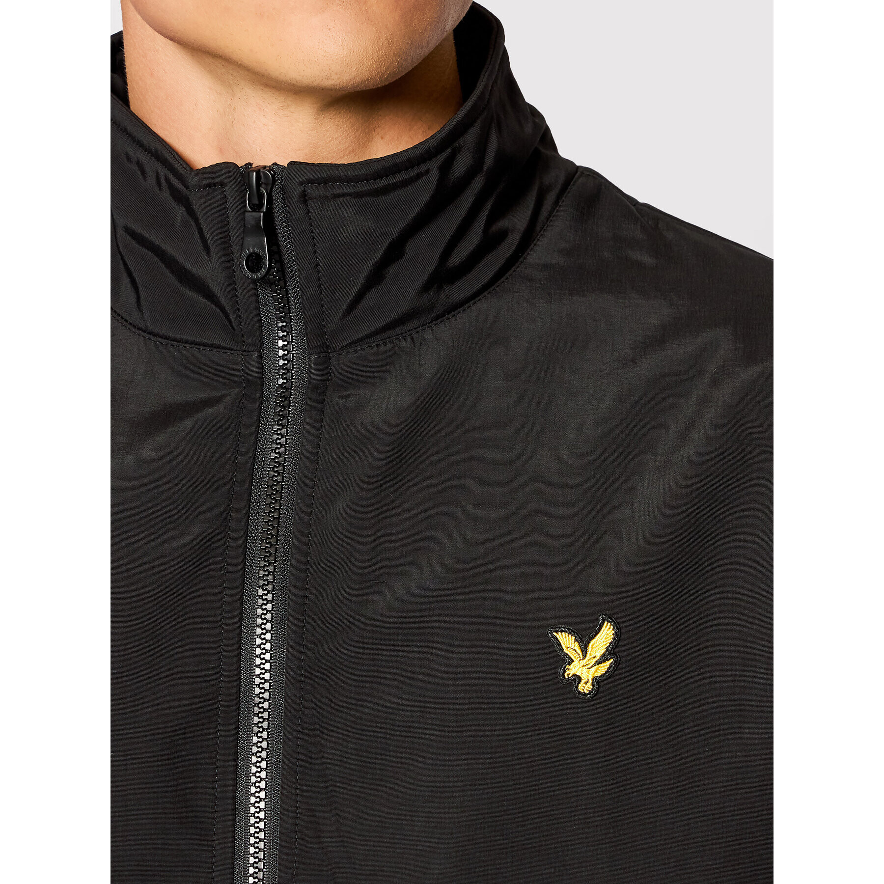 Lyle & Scott Bomber jakna Fleece Lined Funnel Neck JK1516V Črna Regular Fit - Pepit.si