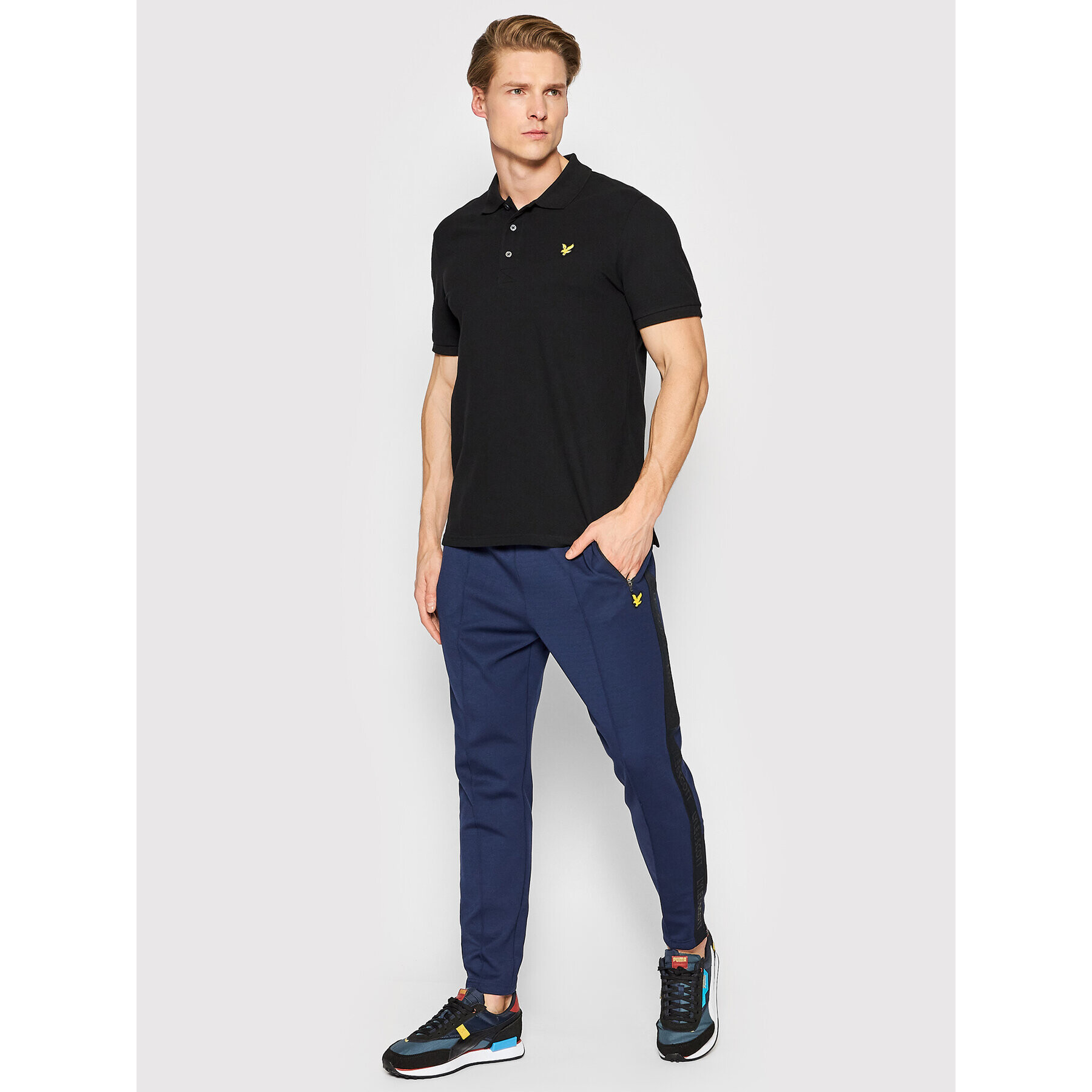 Lyle & Scott Spodnji del trenirke Side Tape TR1485SP Mornarsko modra Regular Fit - Pepit.si