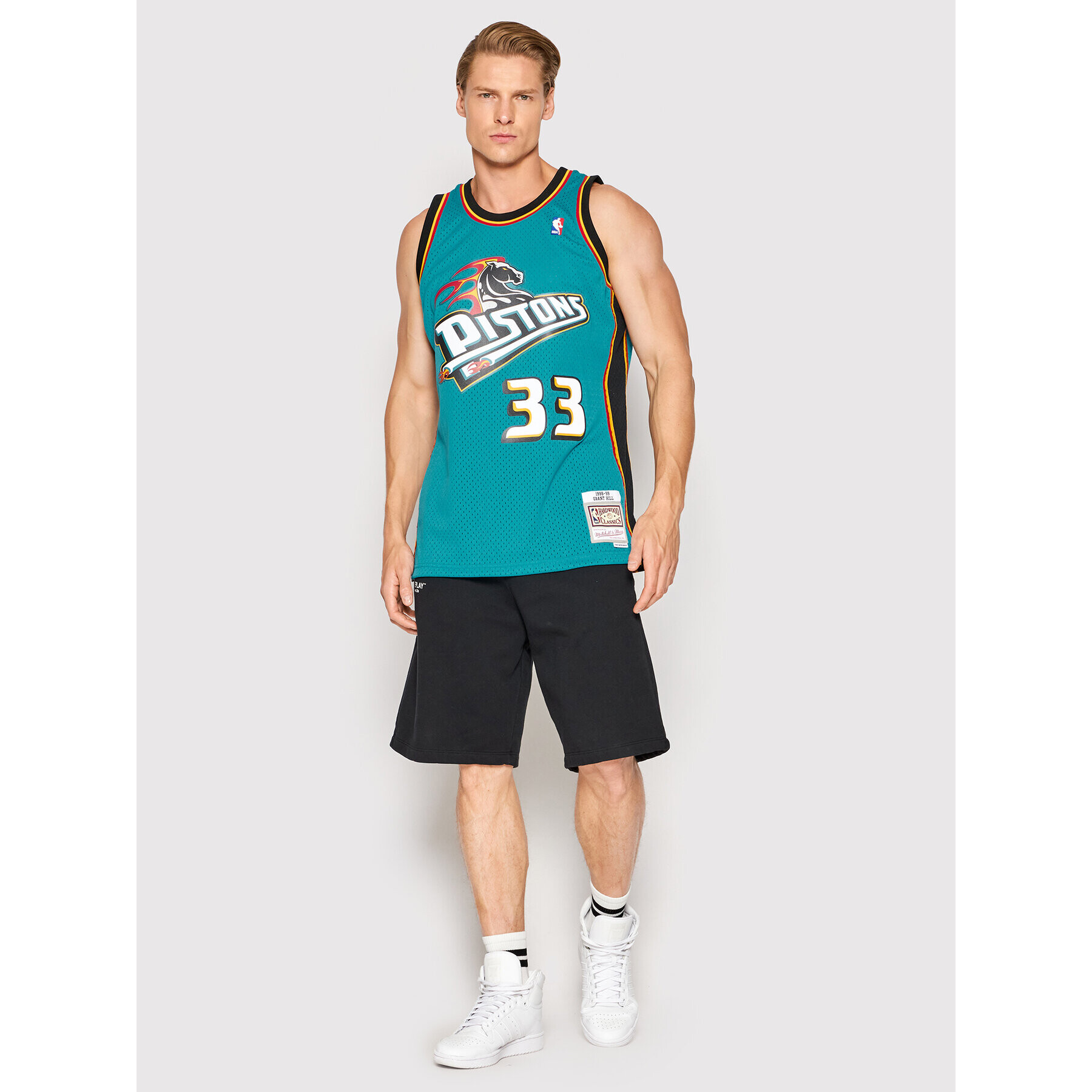 Mitchell & Ness Majica brez rokavov SMJYGS18164 Modra Regular Fit - Pepit.si