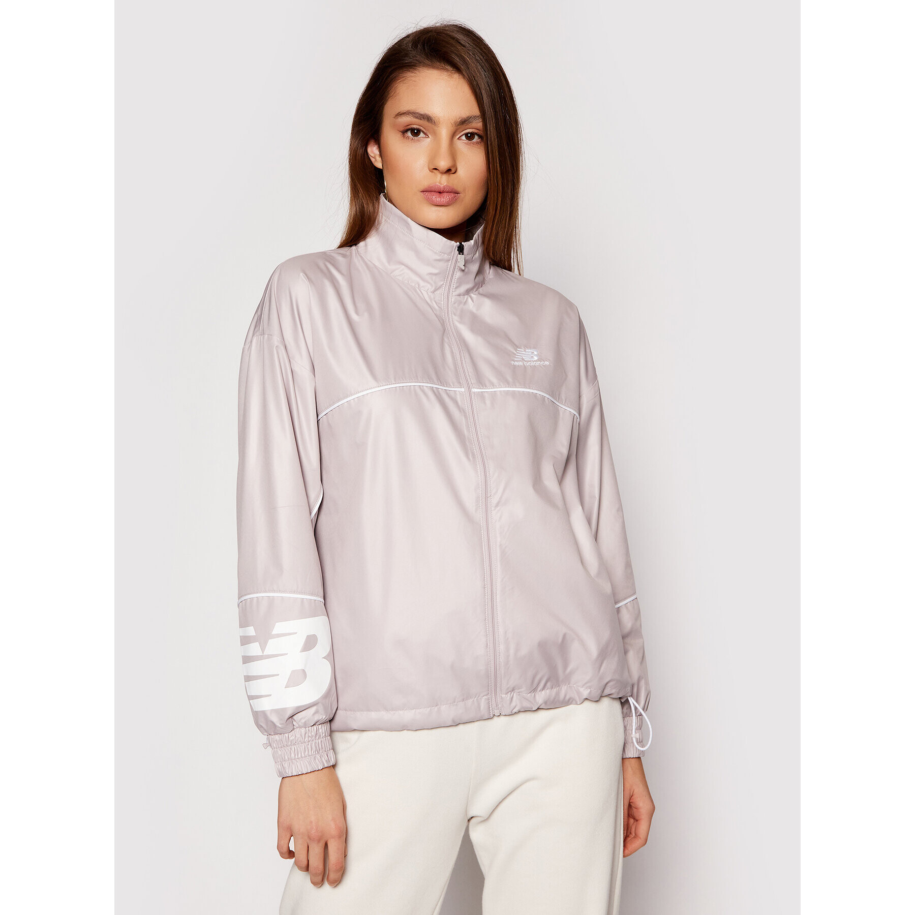 New Balance Prehodna jakna Athletics Windbreaker WJ11502 Siva Relaxed Fit - Pepit.si