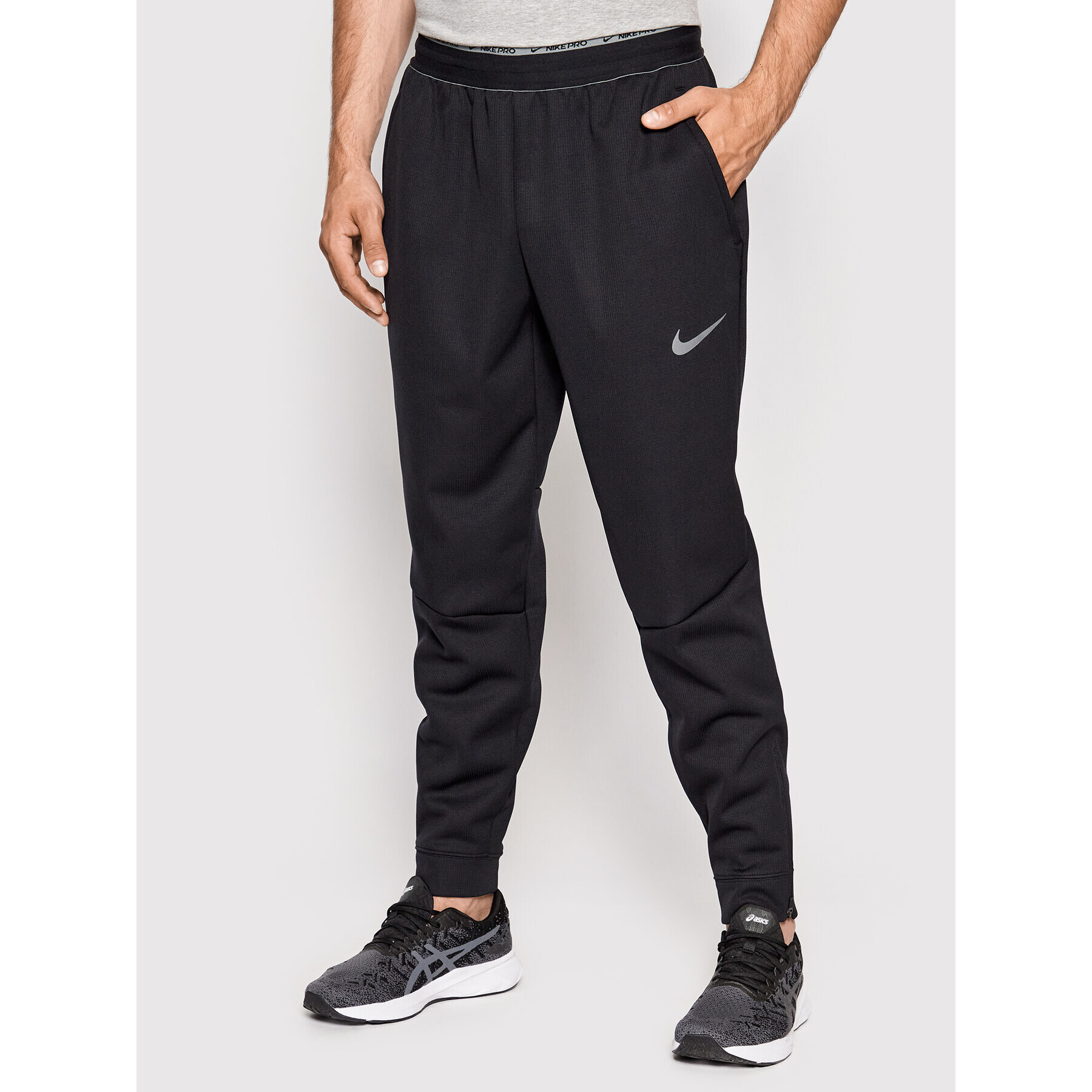 Nike Spodnji del trenirke Pro Therma-Fit DD2122 Črna Standard Fit - Pepit.si