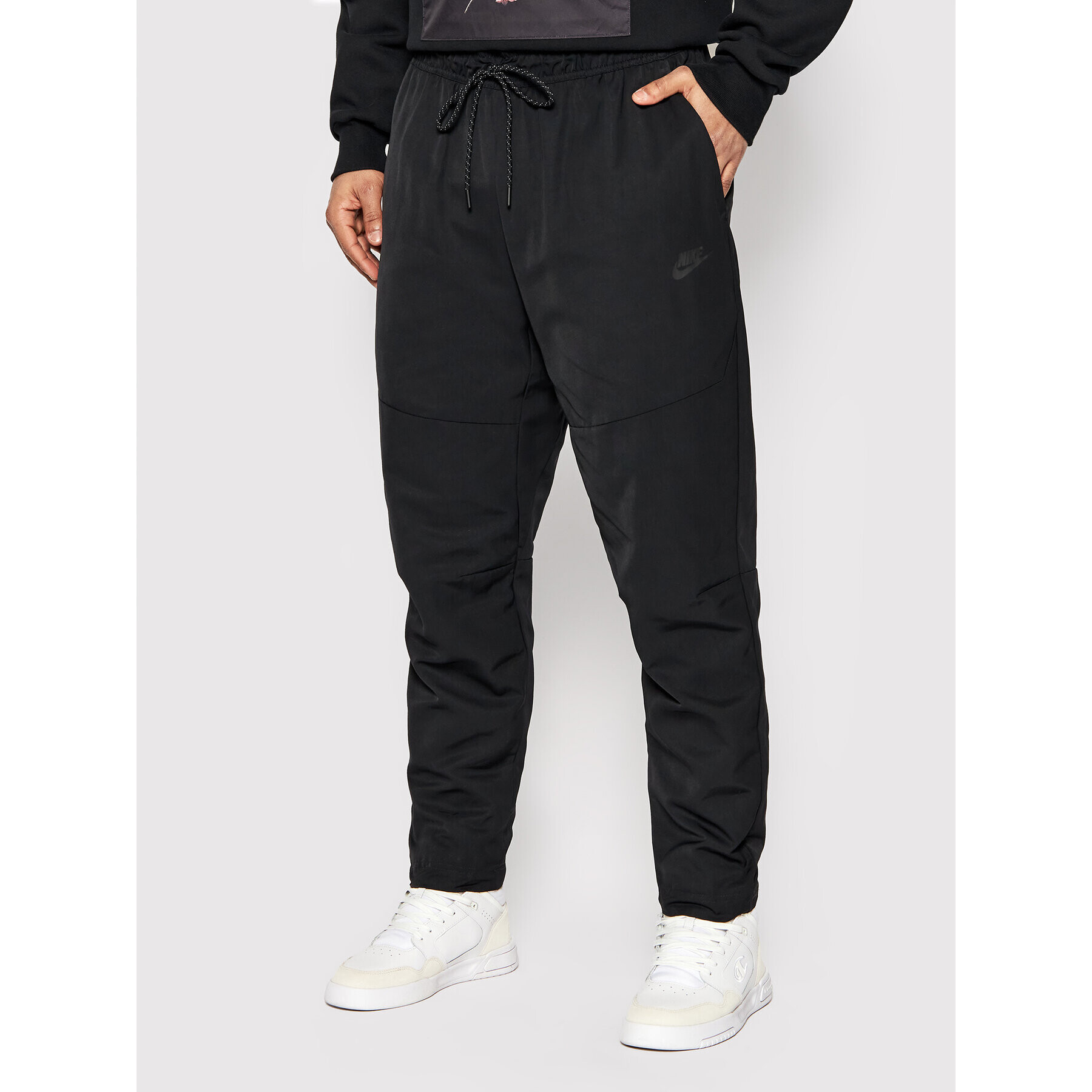 Nike Spodnji del trenirke Tech Essentials CU4487 Črna Standard Fit - Pepit.si