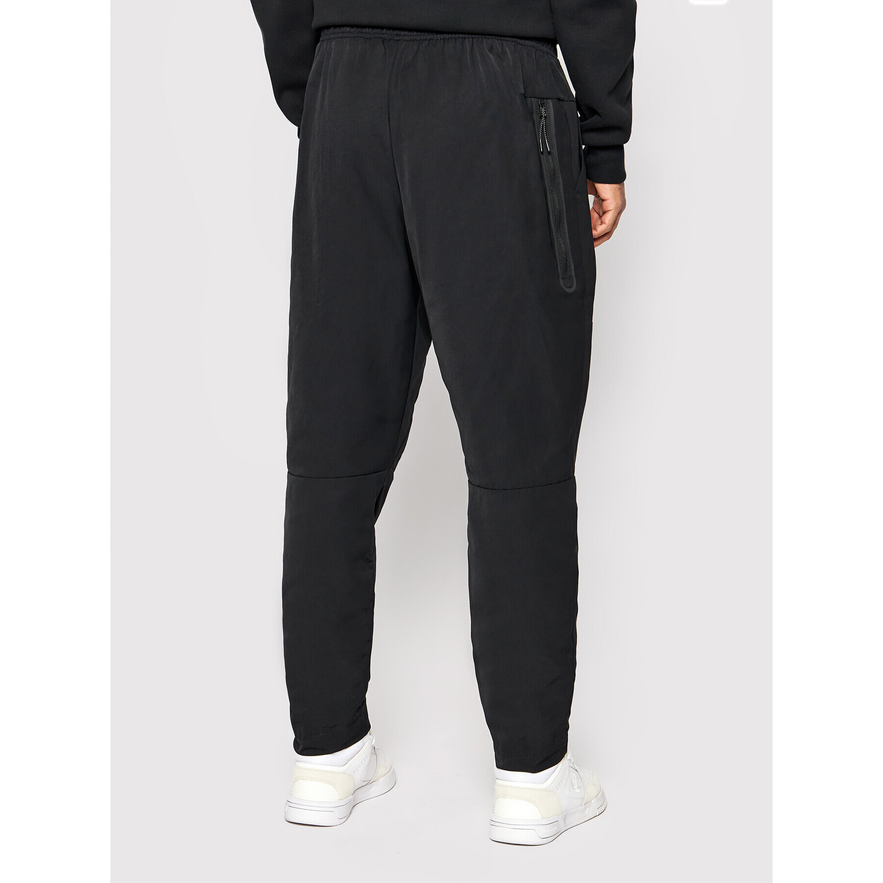 Nike Spodnji del trenirke Tech Essentials CU4487 Črna Standard Fit - Pepit.si