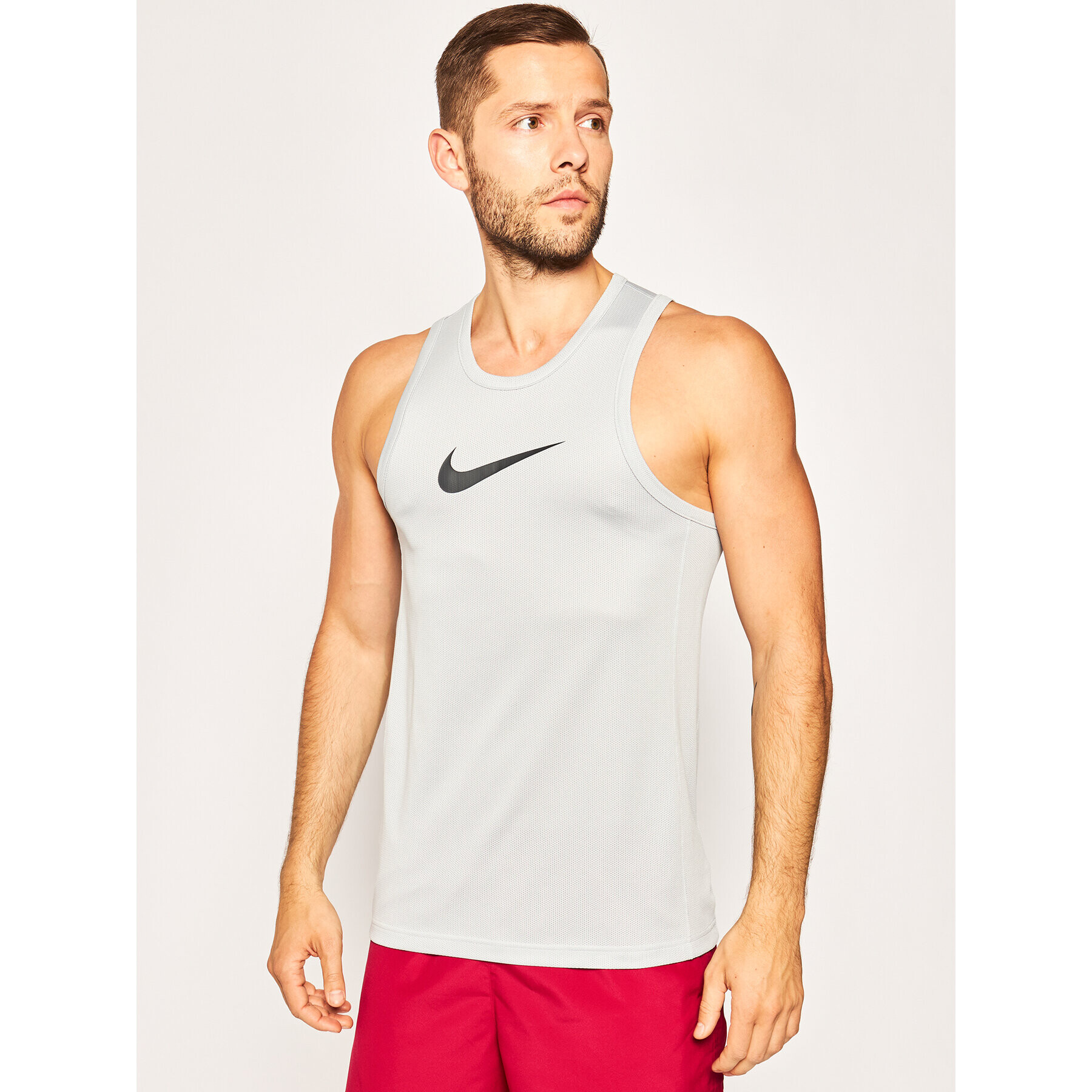 Nike Športna majica Dri-Fit Crossover BV9387 Siva Regular Fit - Pepit.si