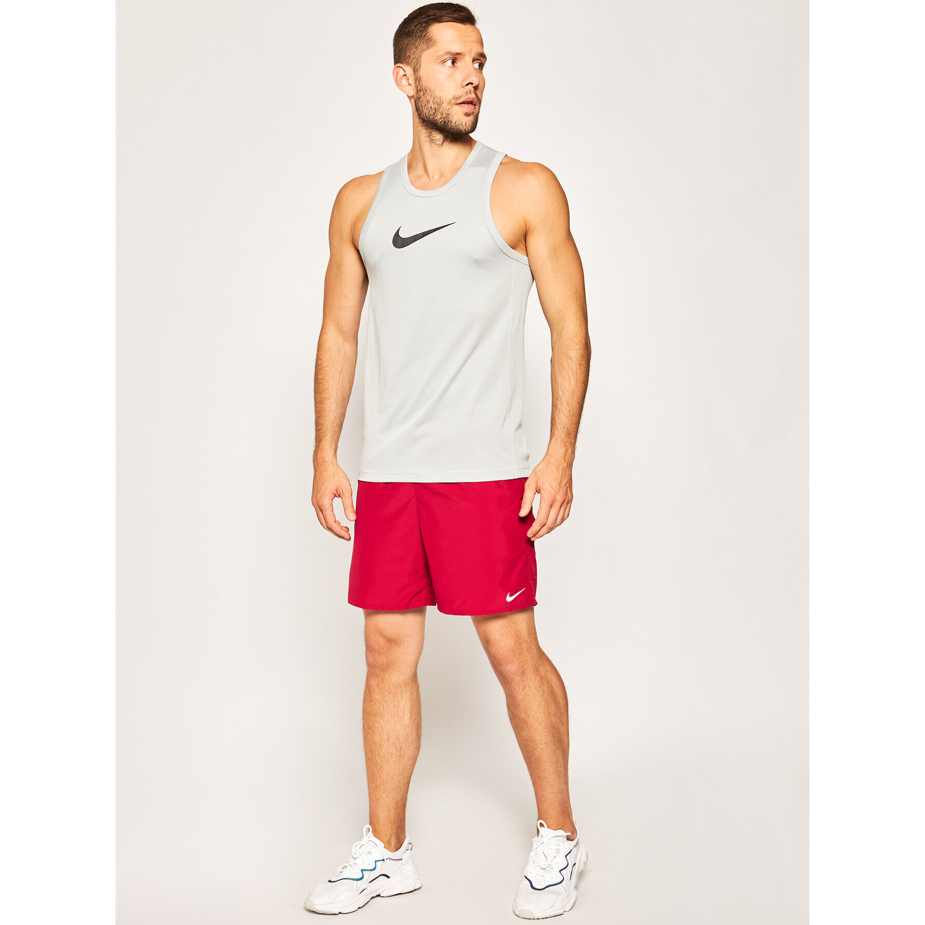 Nike Športna majica Dri-Fit Crossover BV9387 Siva Regular Fit - Pepit.si