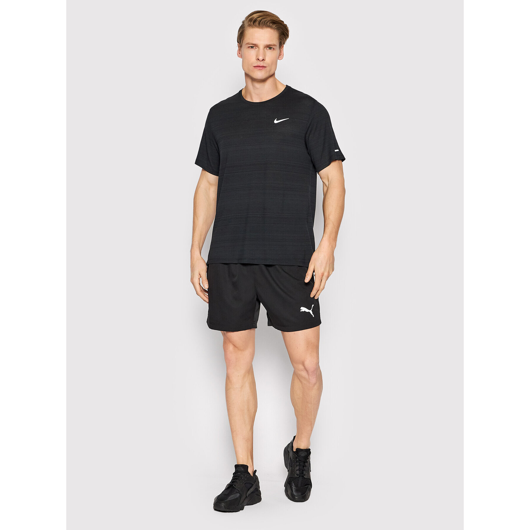 Nike Športna majica Dri-FIT Miler CU5992 Črna Regular Fit - Pepit.si