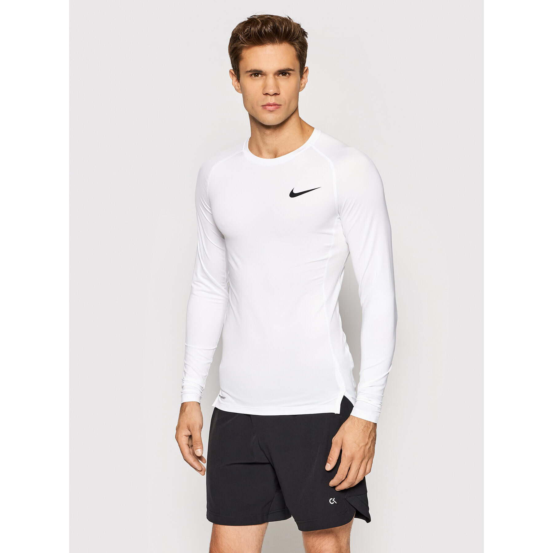 Nike Športna majica Pro BV5588 Bela Slim Fit - Pepit.si