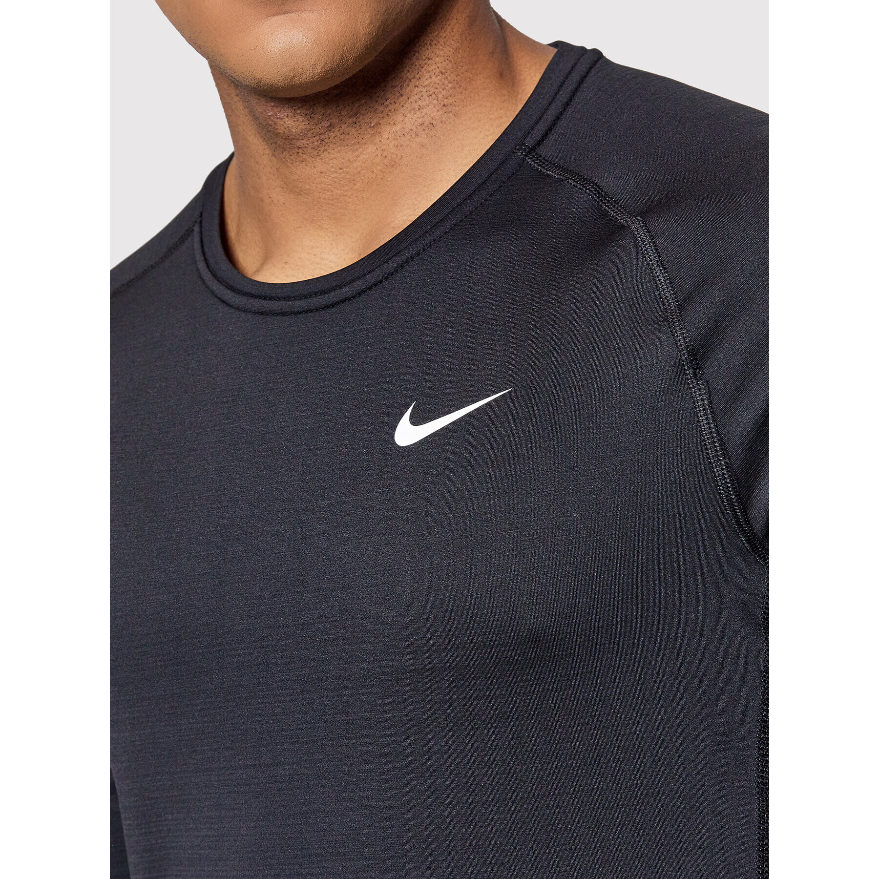 Nike Športna majica Pro Warm CU6740 Črna Slim Fit - Pepit.si