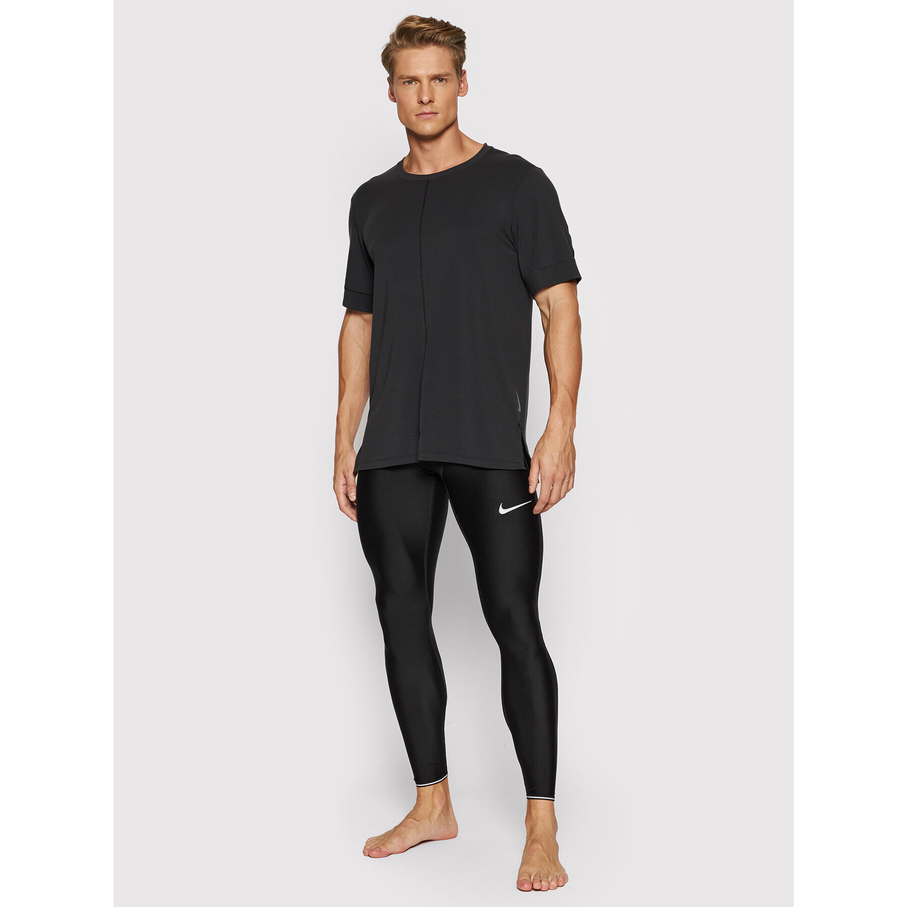 Nike Športna majica Yoga Dri-FIT BV4034 Črna Slim Fit - Pepit.si