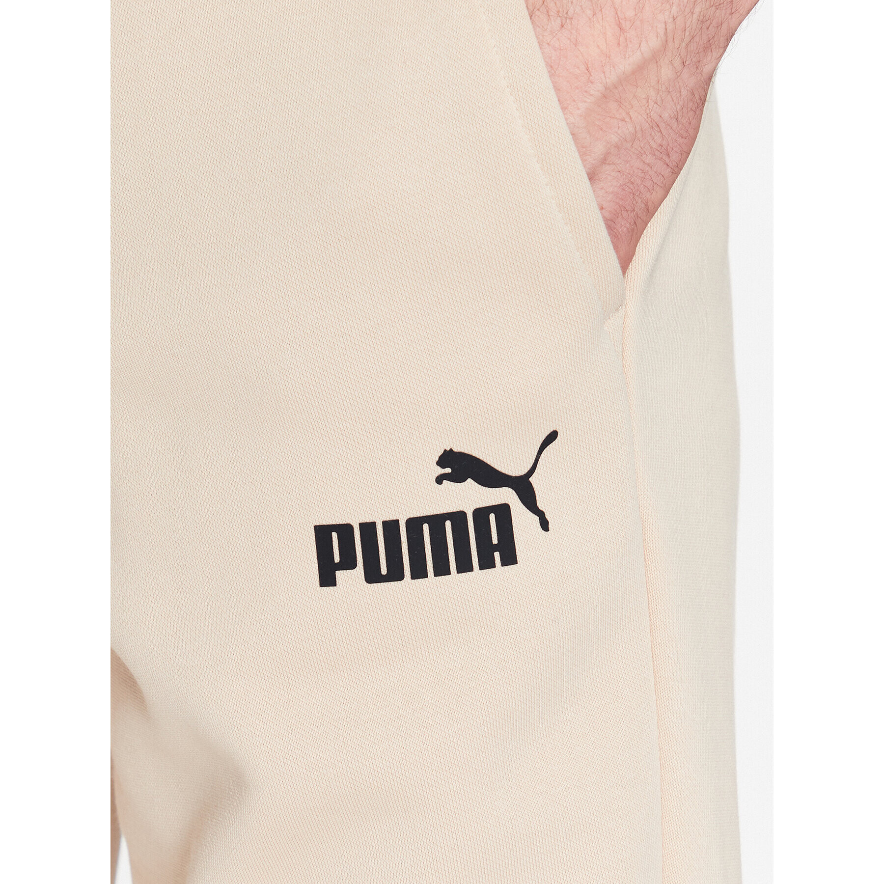 Puma Spodnji del trenirke Ess Logo 586715 Bež Regular Fit - Pepit.si